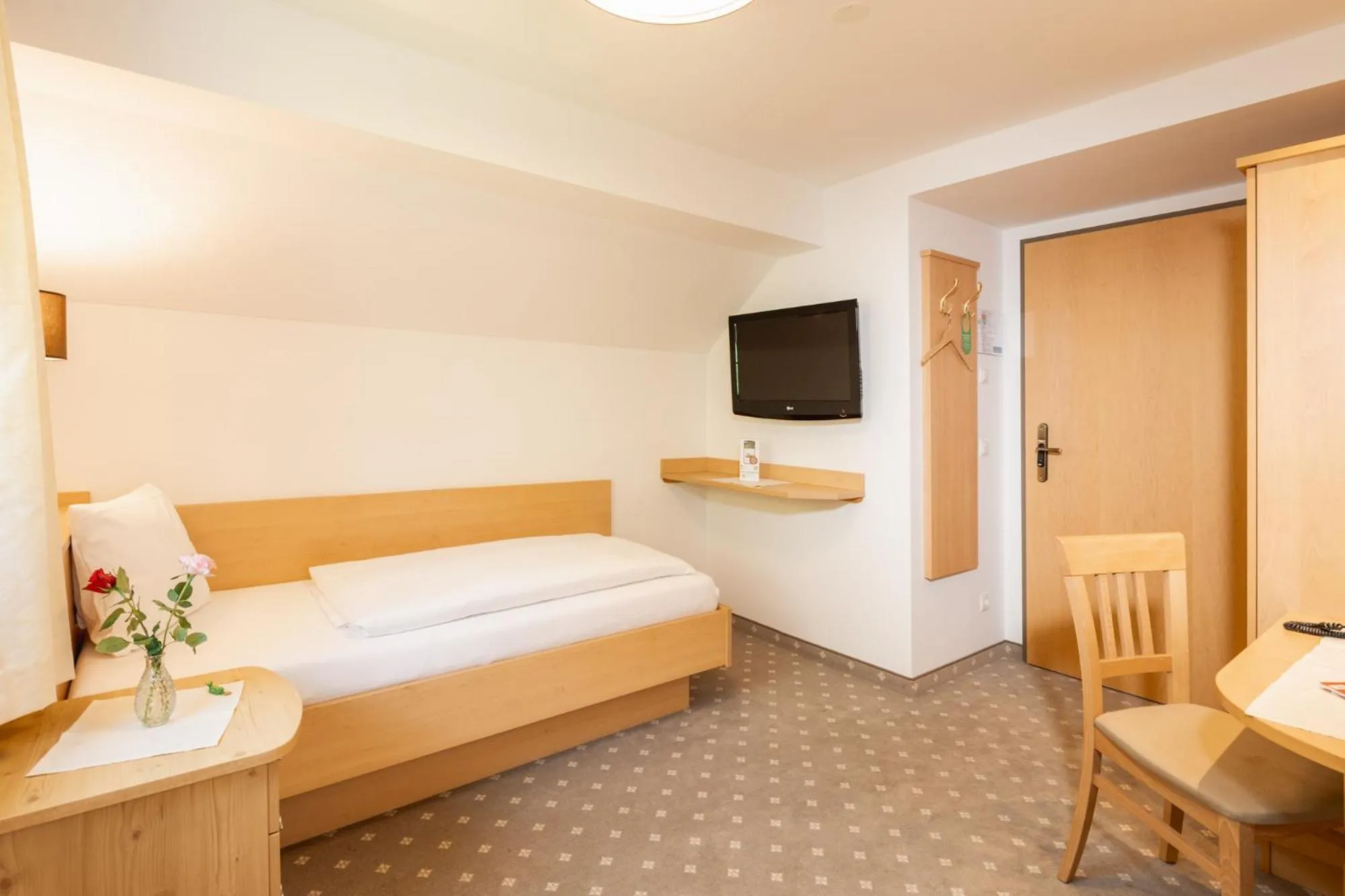 Photo of the whole room, Bed in Landhotel Stofflerwirt