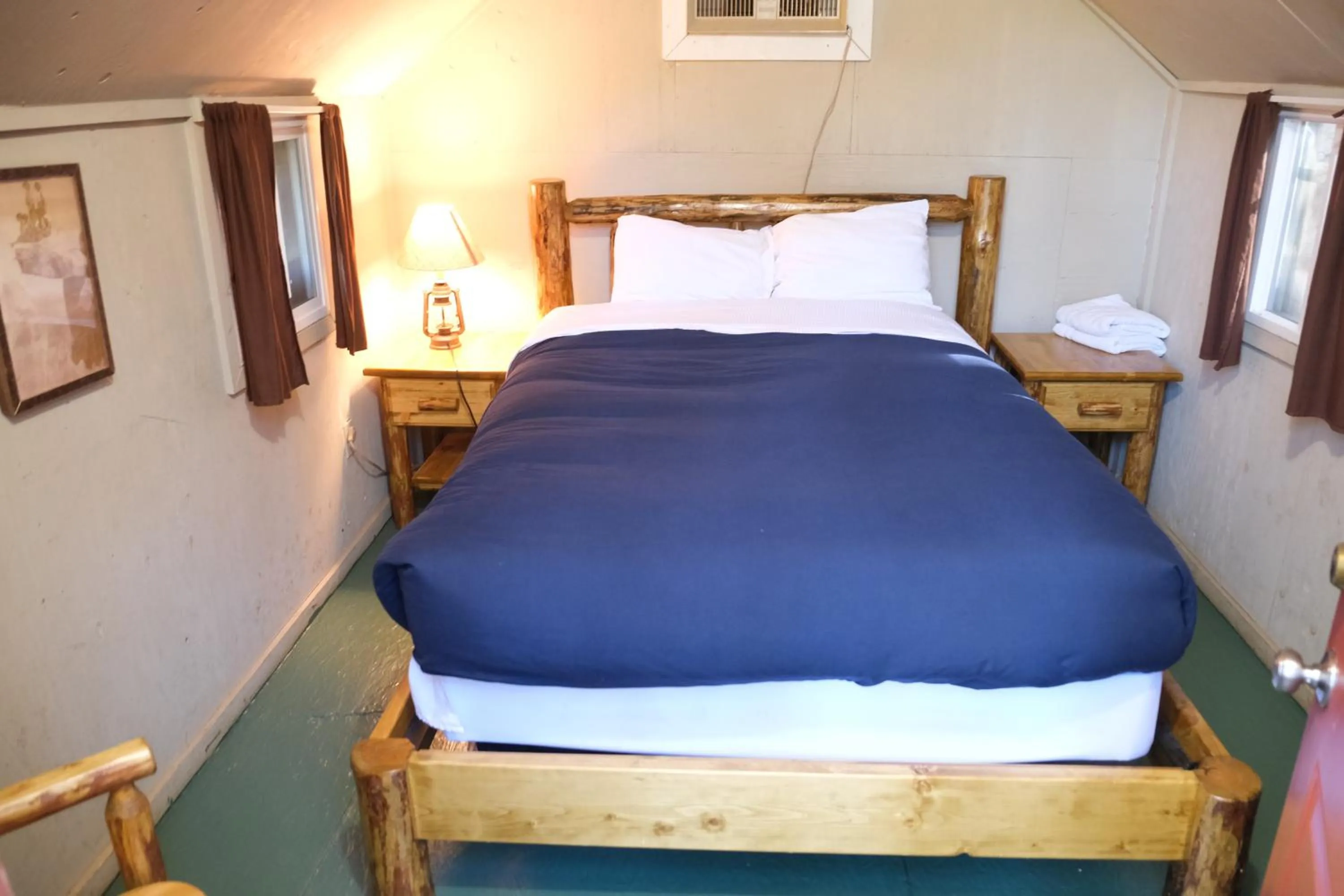 Bed in Yosemite Bug Rustic Mountain Resort