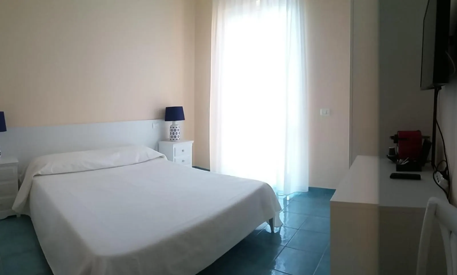 Bed in VILLA FLORA ARGENTARIO