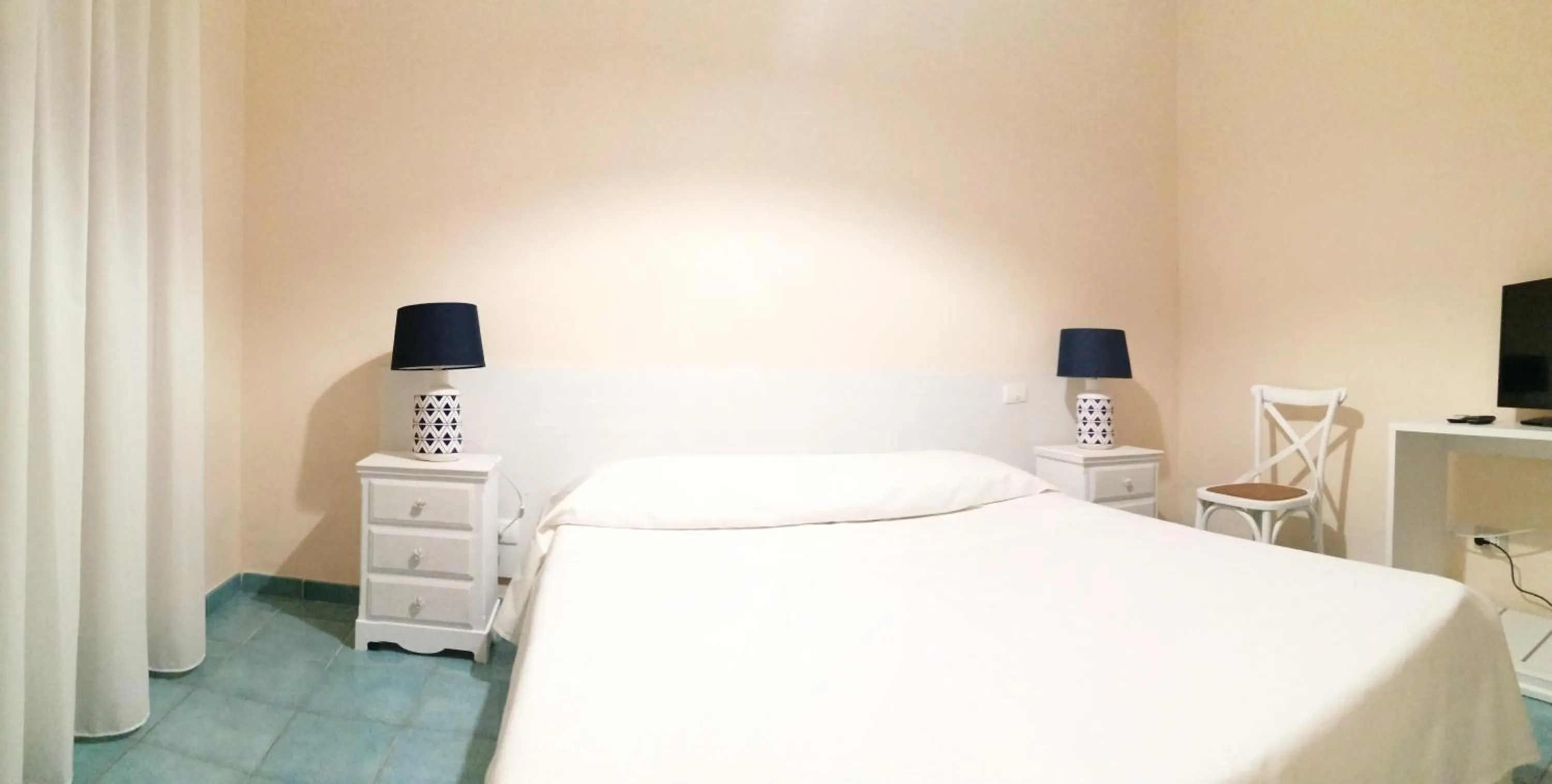 Bed in VILLA FLORA ARGENTARIO