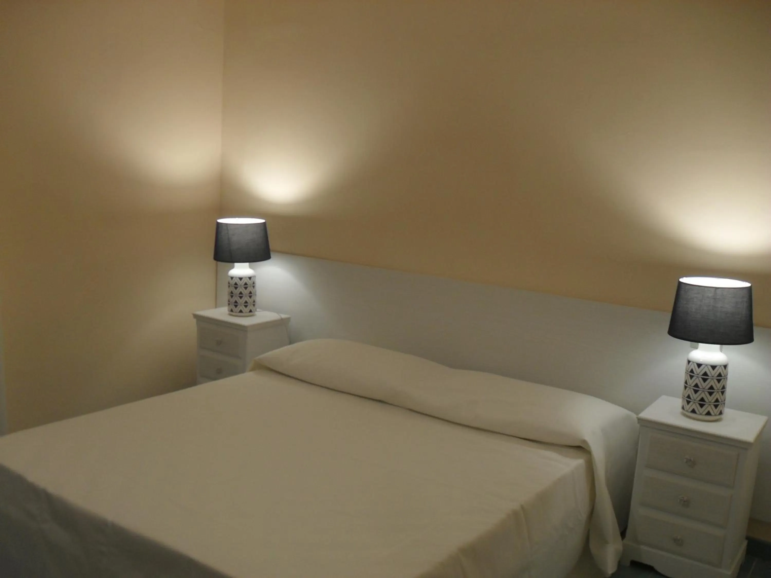 Bed in VILLA FLORA ARGENTARIO