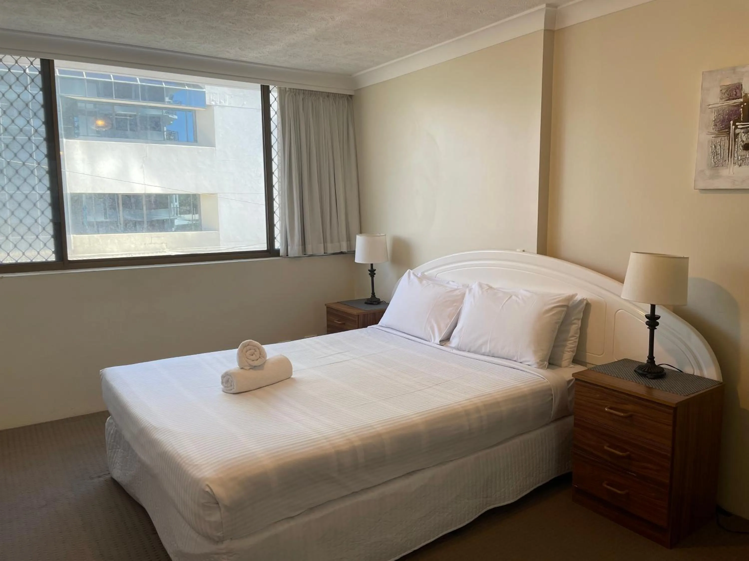 Bed in Aries Holiday Apartments