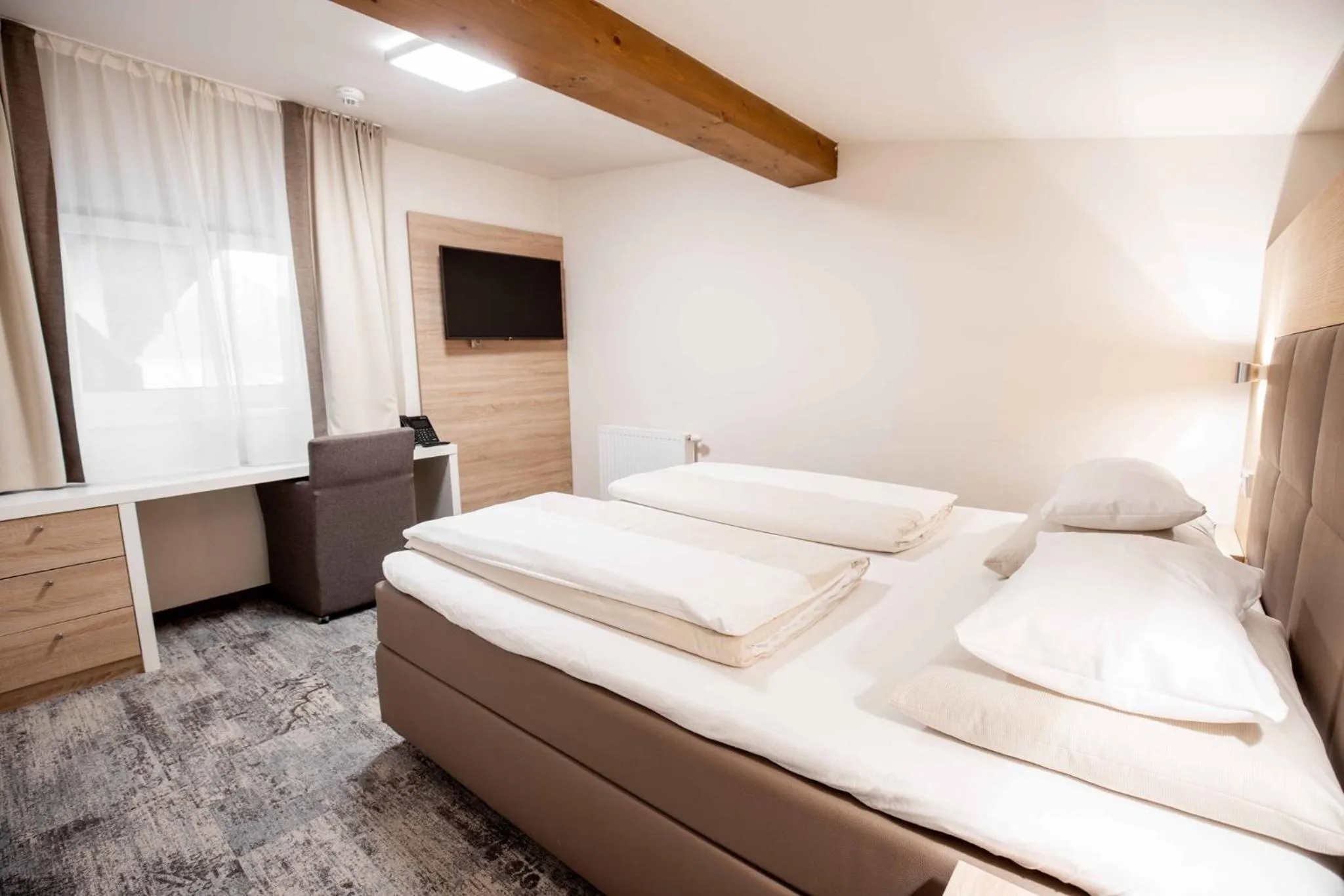 Bedroom, Bed in Das Walchsee Resort