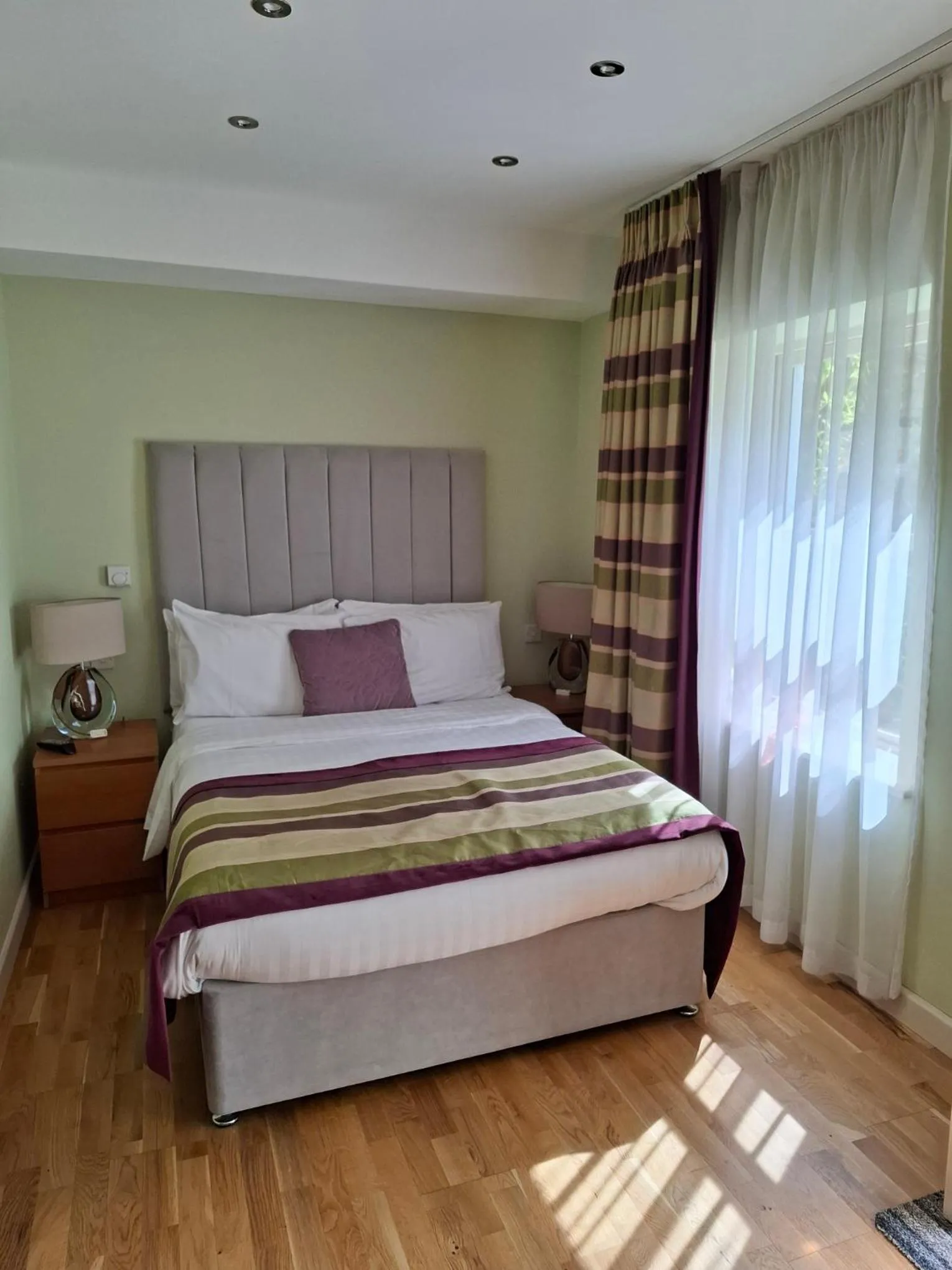 Bed in Palm Grove Apartments