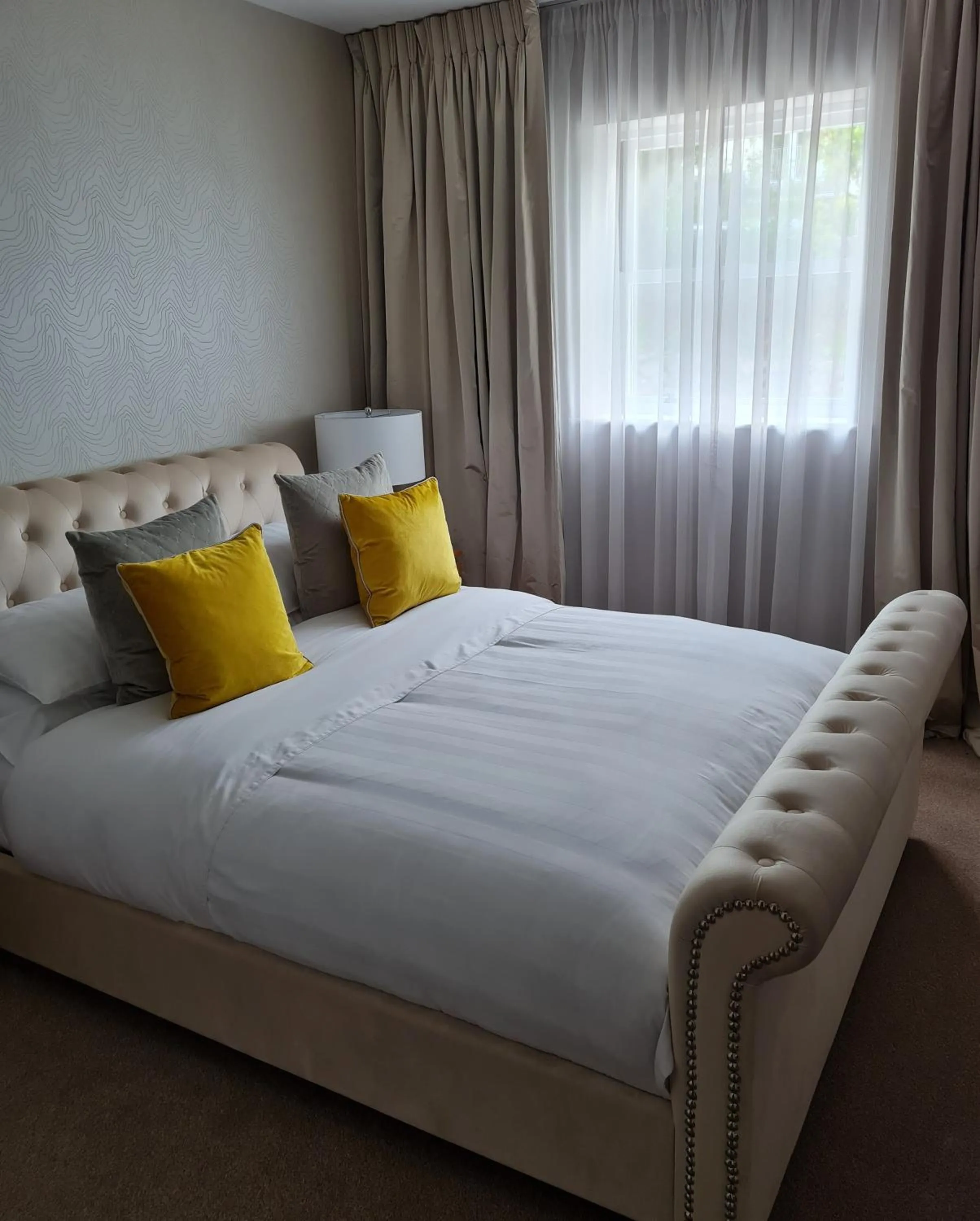 Bed in Palm Grove Apartments