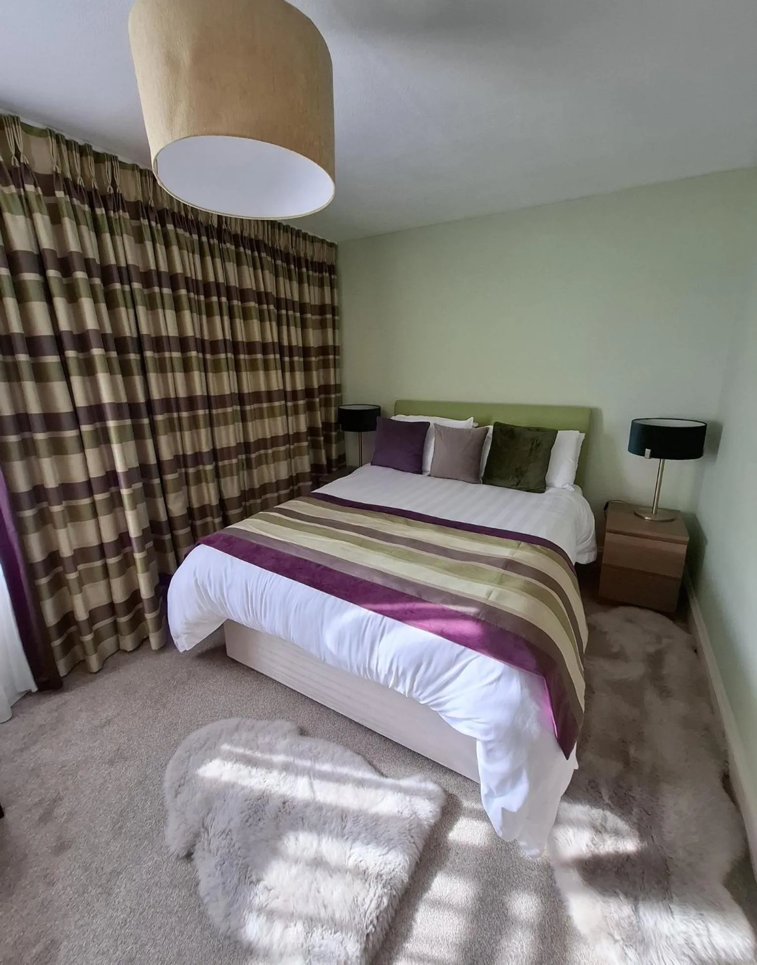 Bed in Palm Grove Apartments