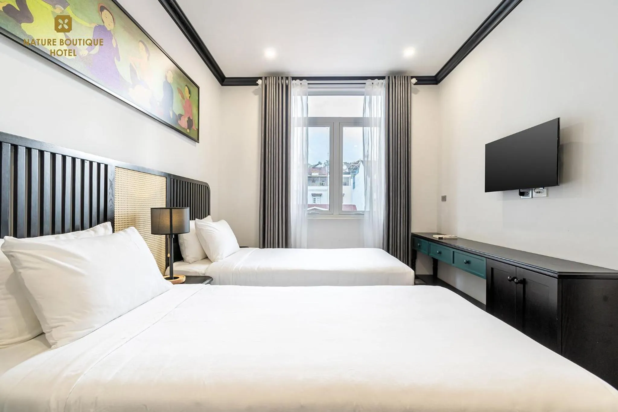 Photo of the whole room, Bed in Nature Boutique Hotel - Nguyen Thi Nghia