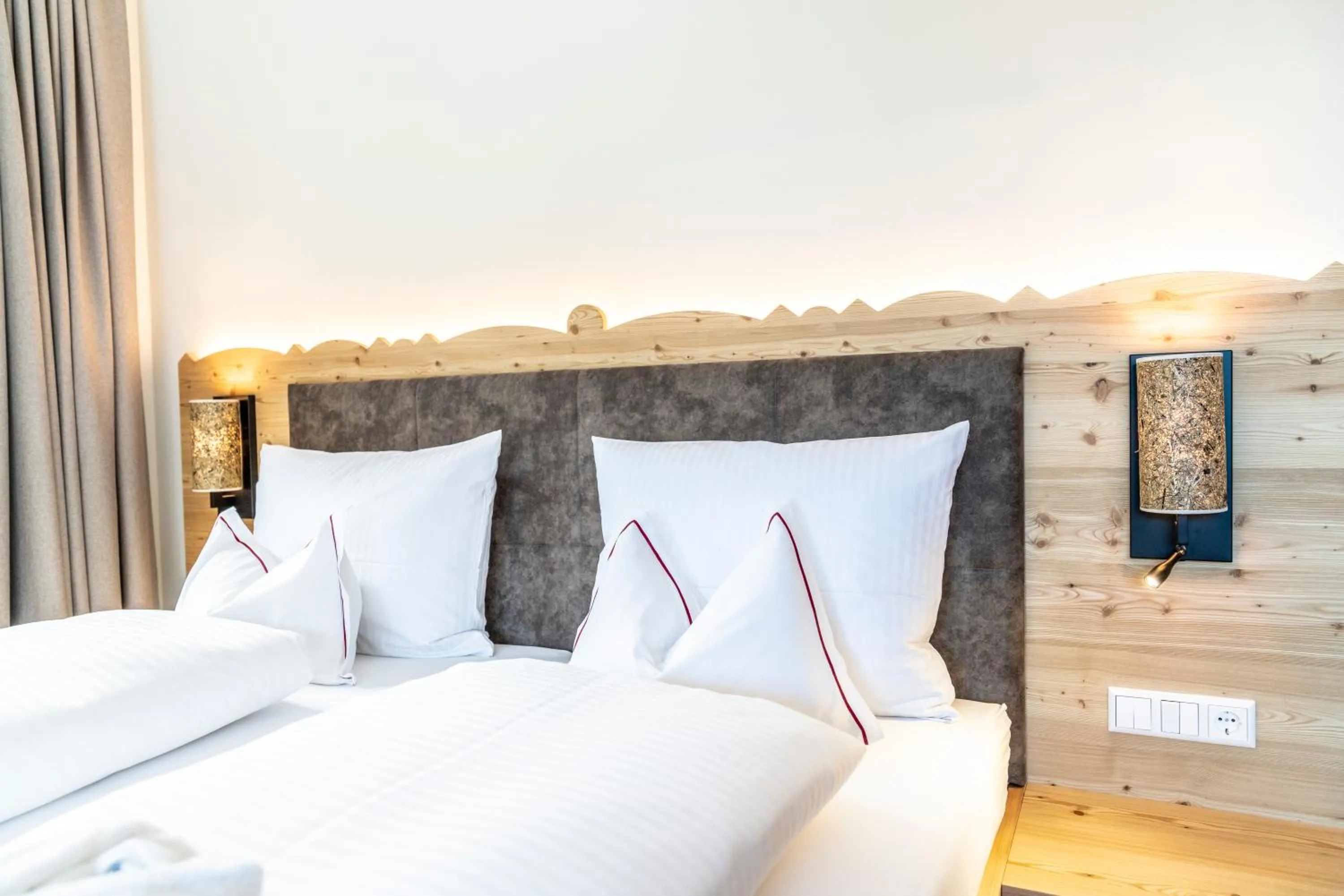 Bed in Hotel Trattlerhof