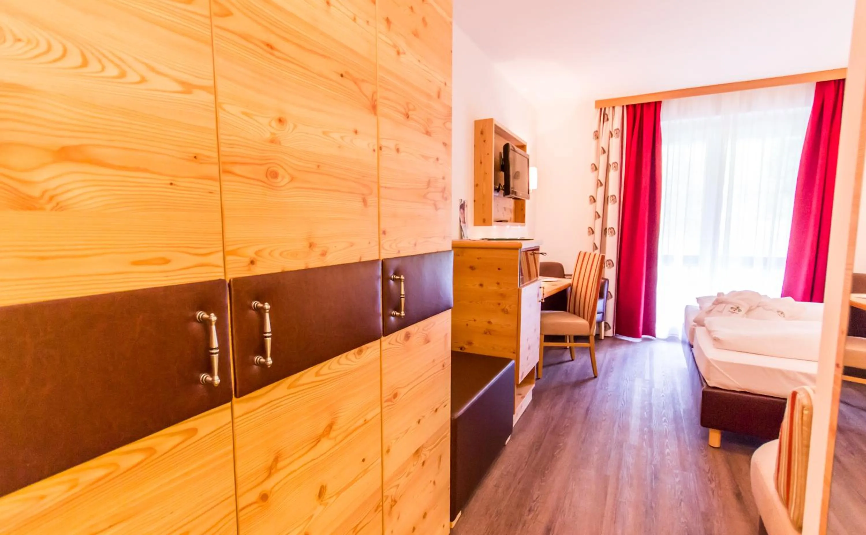 Bed in Hotel Trattlerhof