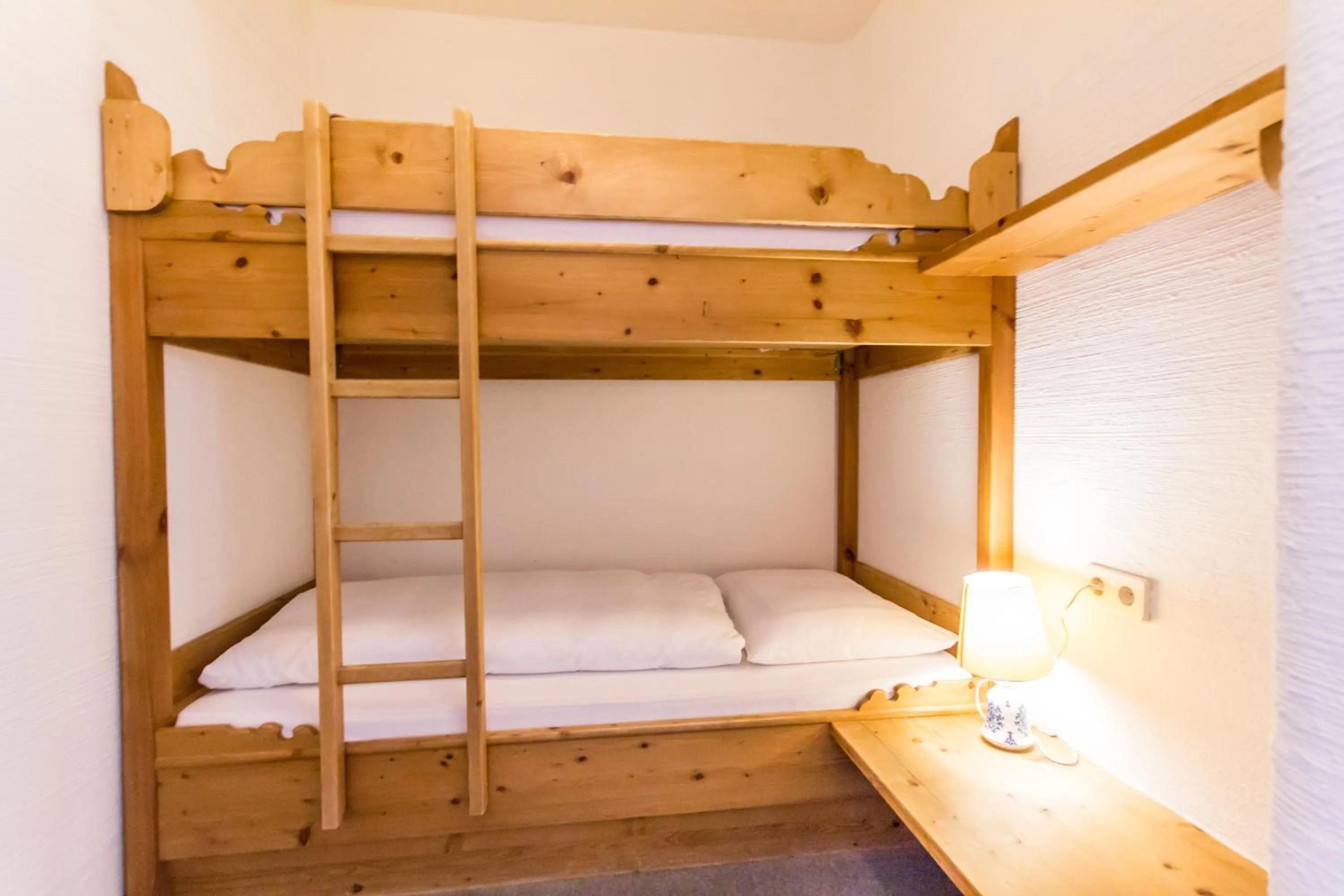 Bed in Hotel Trattlerhof