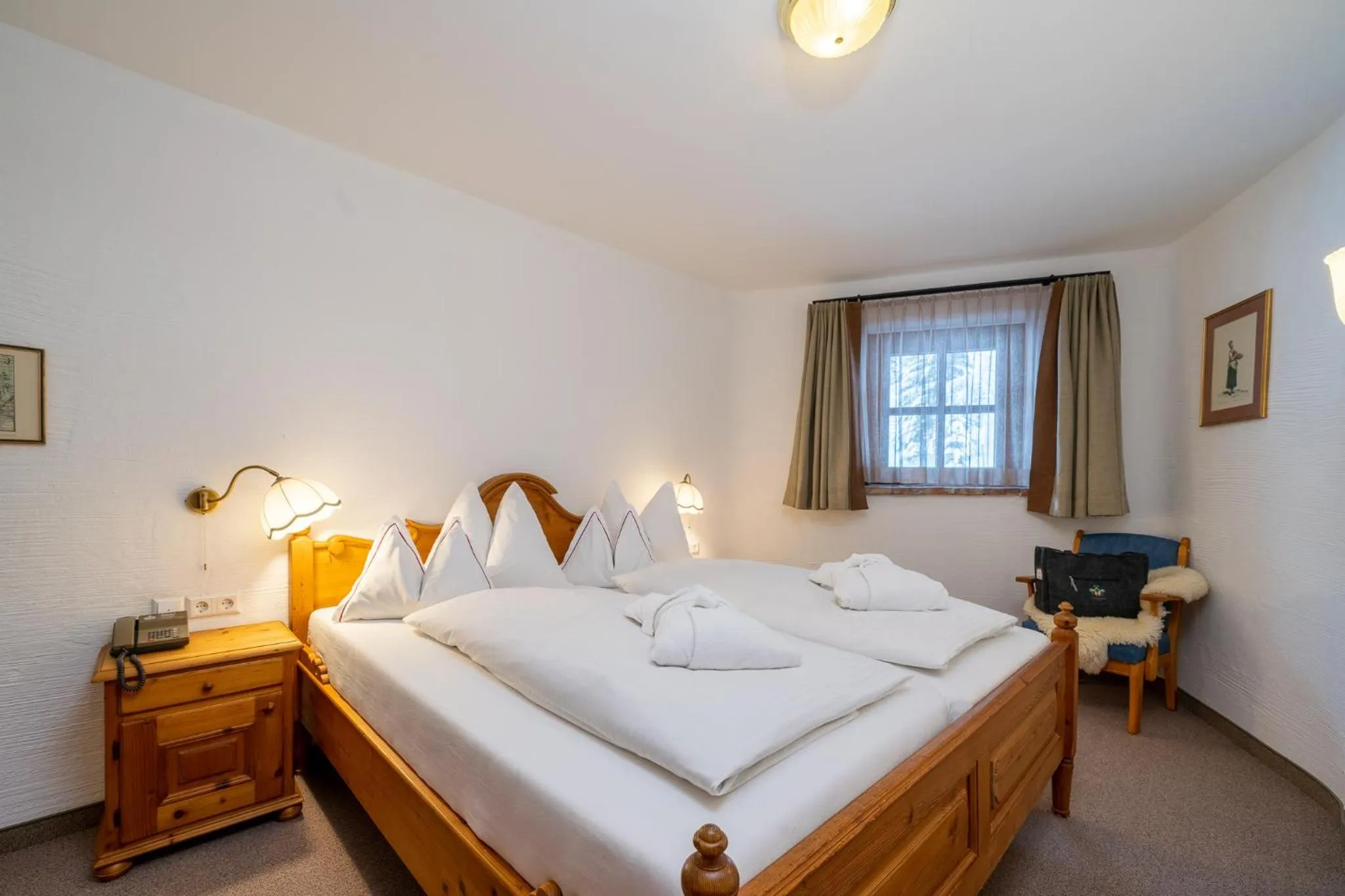 Bedroom, Bed in Hotel Trattlerhof