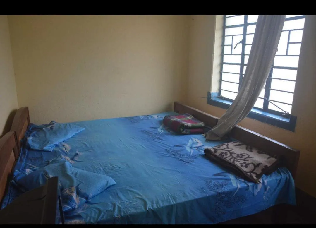 Bed in Vamoose Sadhana Bhaban