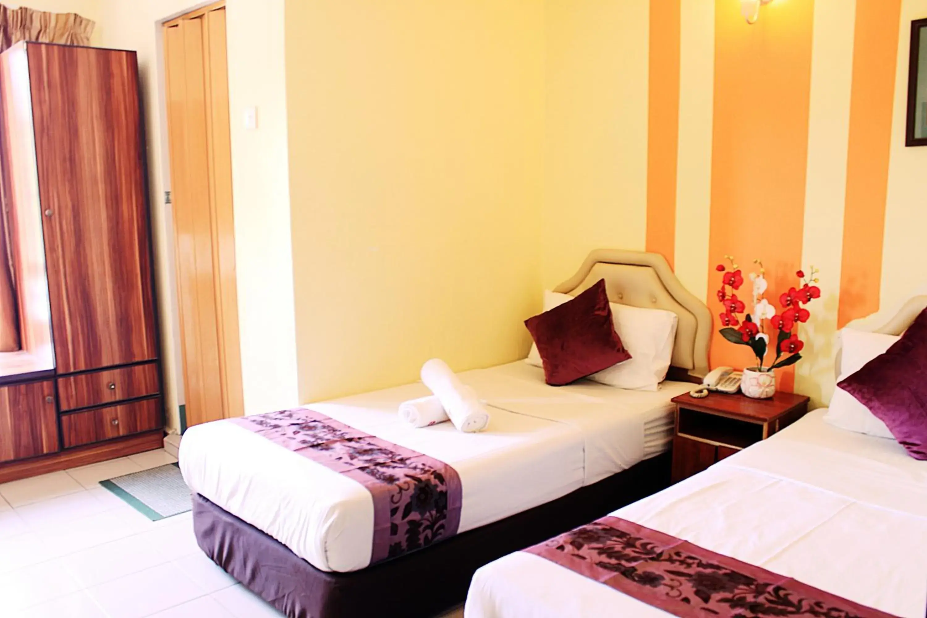 Twin Room in Sun Inns Hotel Meru Raya Twin Room in Sun Inns Hotel Meru Raya