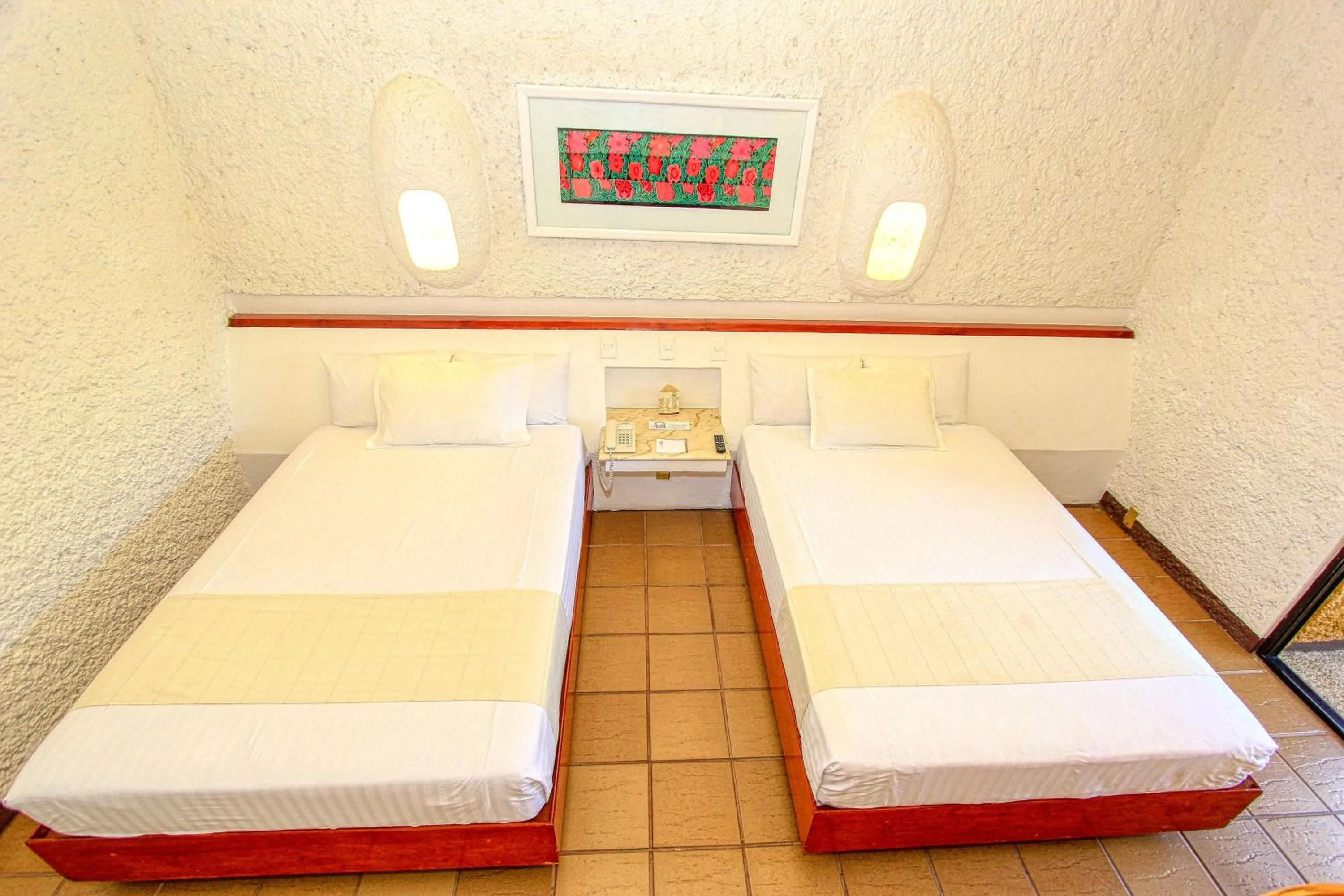 Photo of the whole room, Bed in Hotel Ciudad Real Palenque