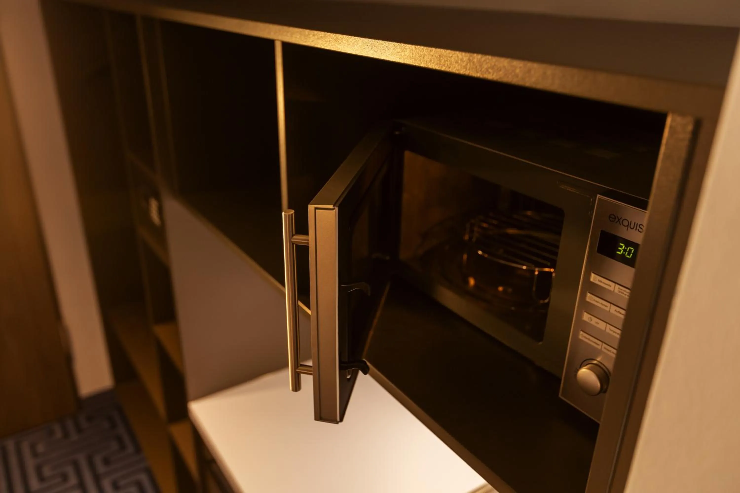 Kitchen or kitchenette in the niu Mood - Apartments