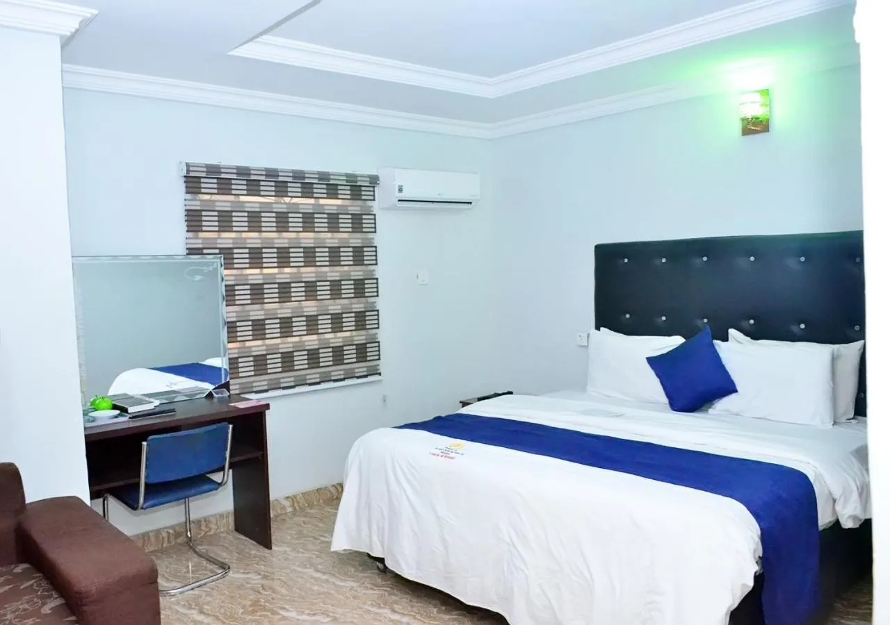 Bed in 24-7 Electricity Agore Hotels and Suites Ltd