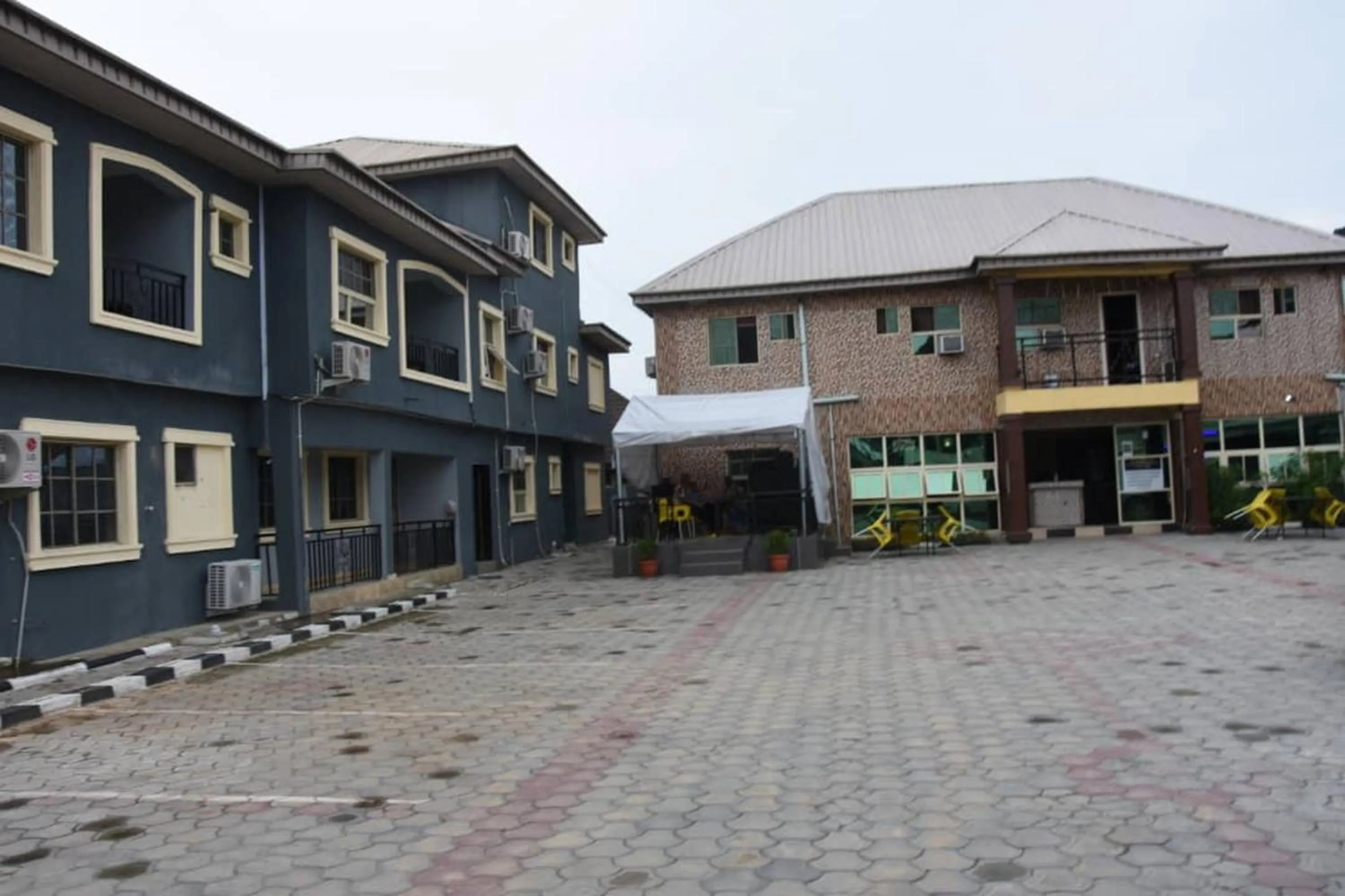 Property building in 24-7 Electricity Agore Hotels and Suites Ltd