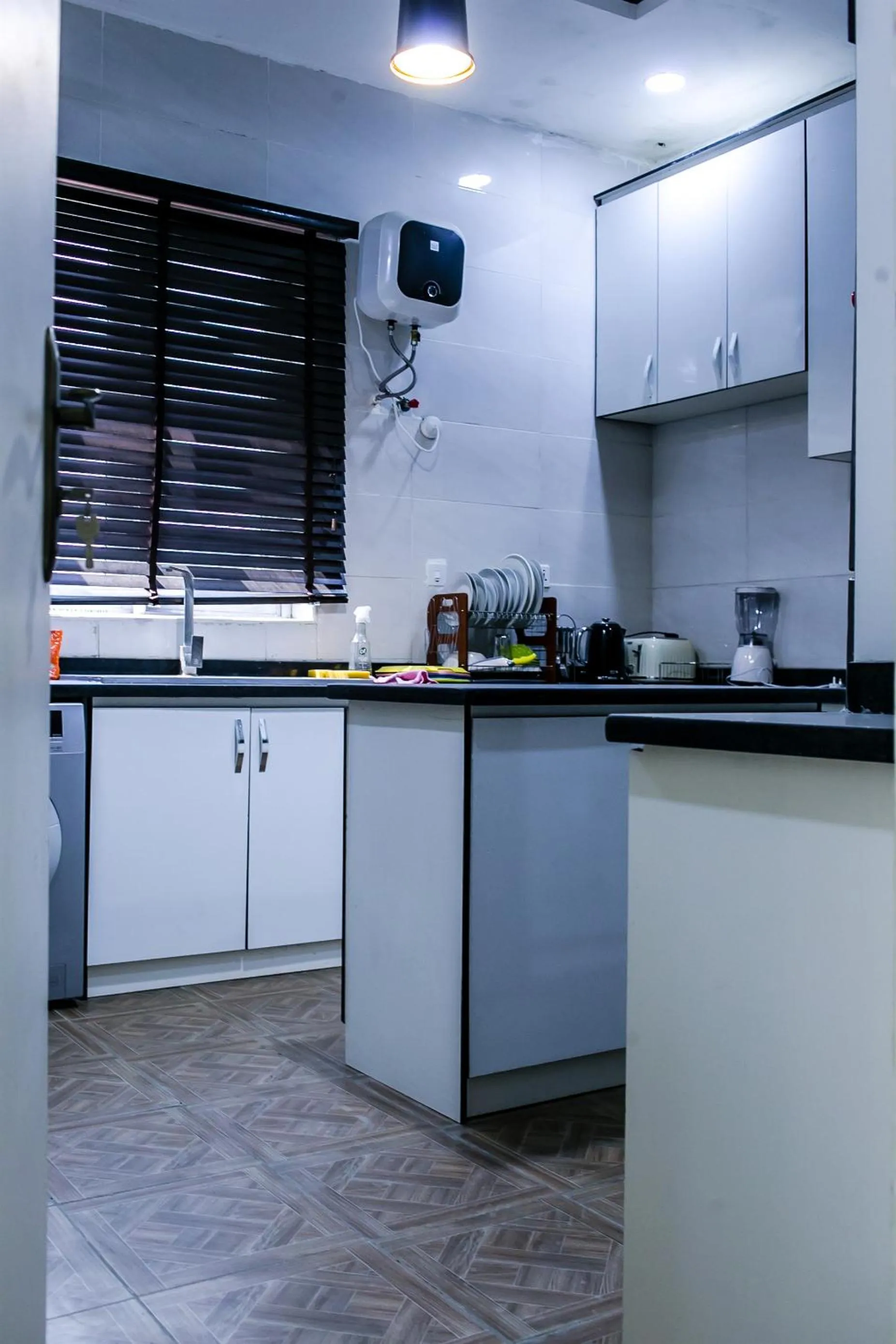 Kitchen or kitchenette in 24-7 Electricity Agore Hotels and Suites Ltd