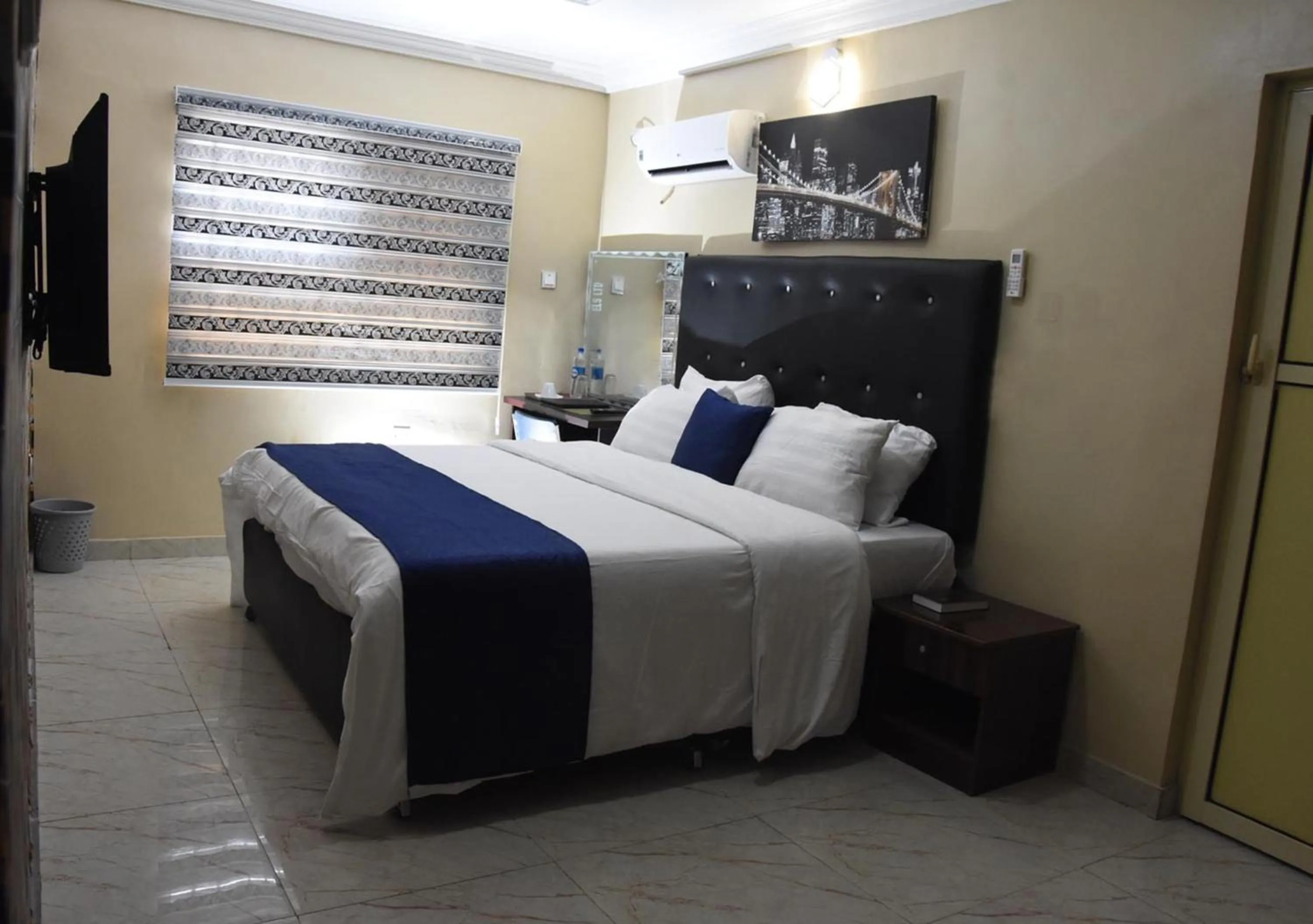 Bed in 24-7 Electricity Agore Hotels and Suites Ltd