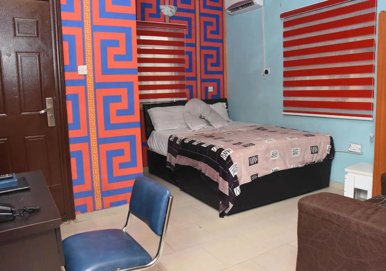 Bed in 24-7 Electricity Agore Hotels and Suites Ltd