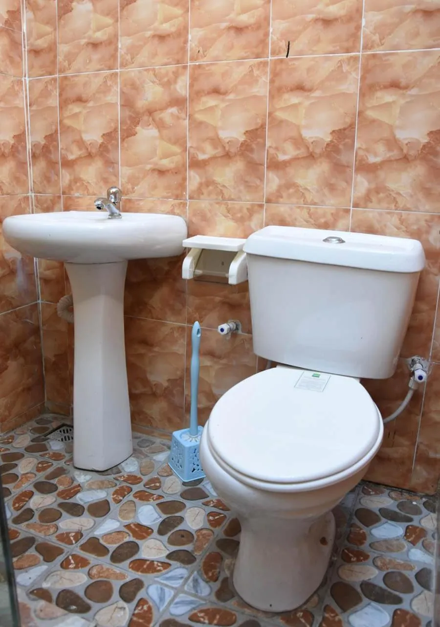 Toilet in 24-7 Electricity Agore Hotels and Suites Ltd