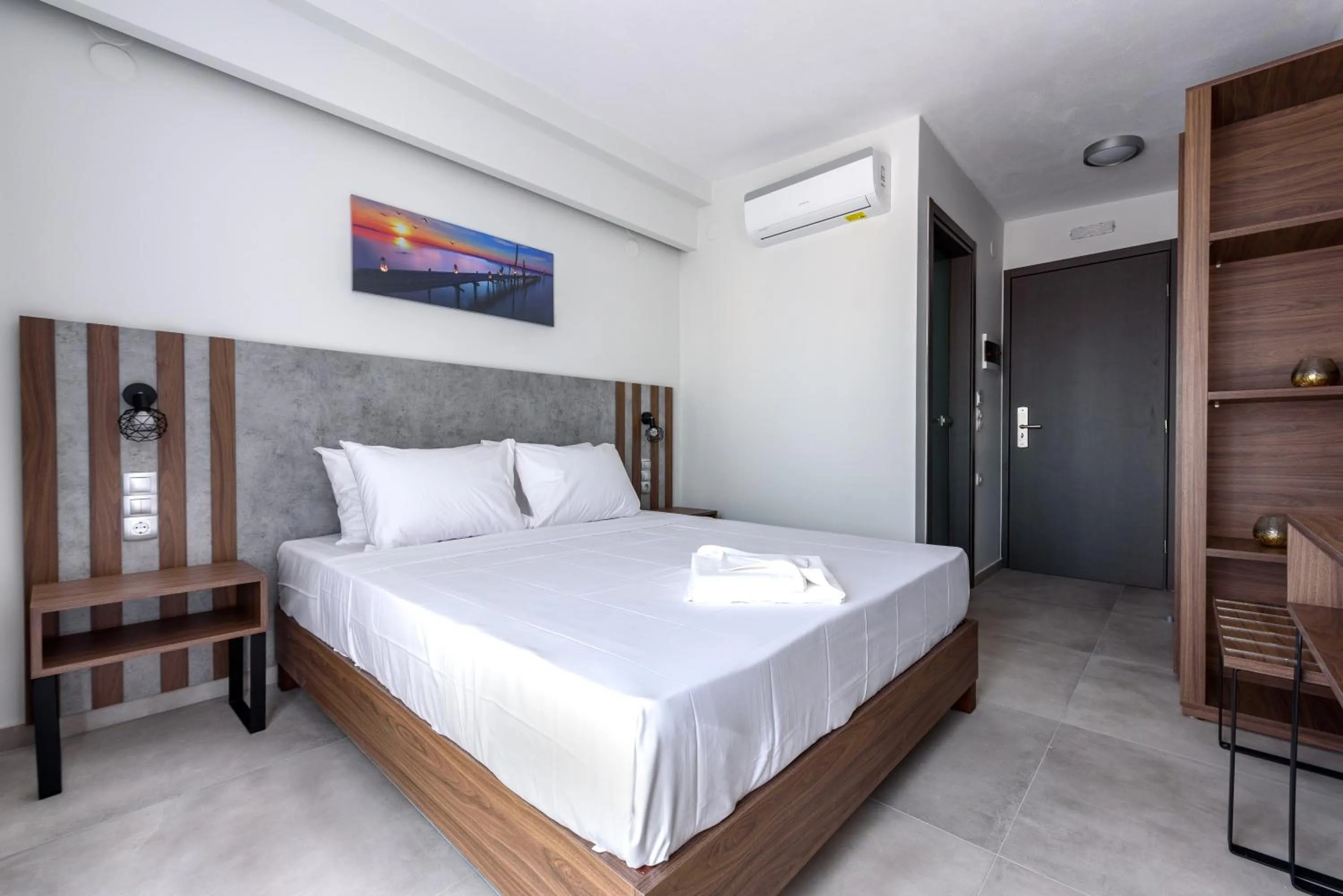 Photo of the whole room, Bed in ASTERAS STUDIOS