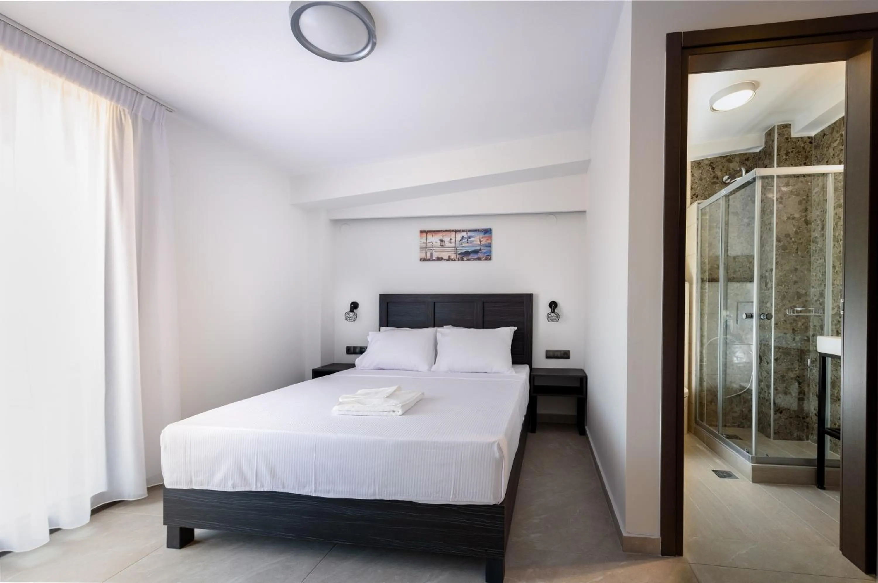 Photo of the whole room, Bed in ASTERAS STUDIOS