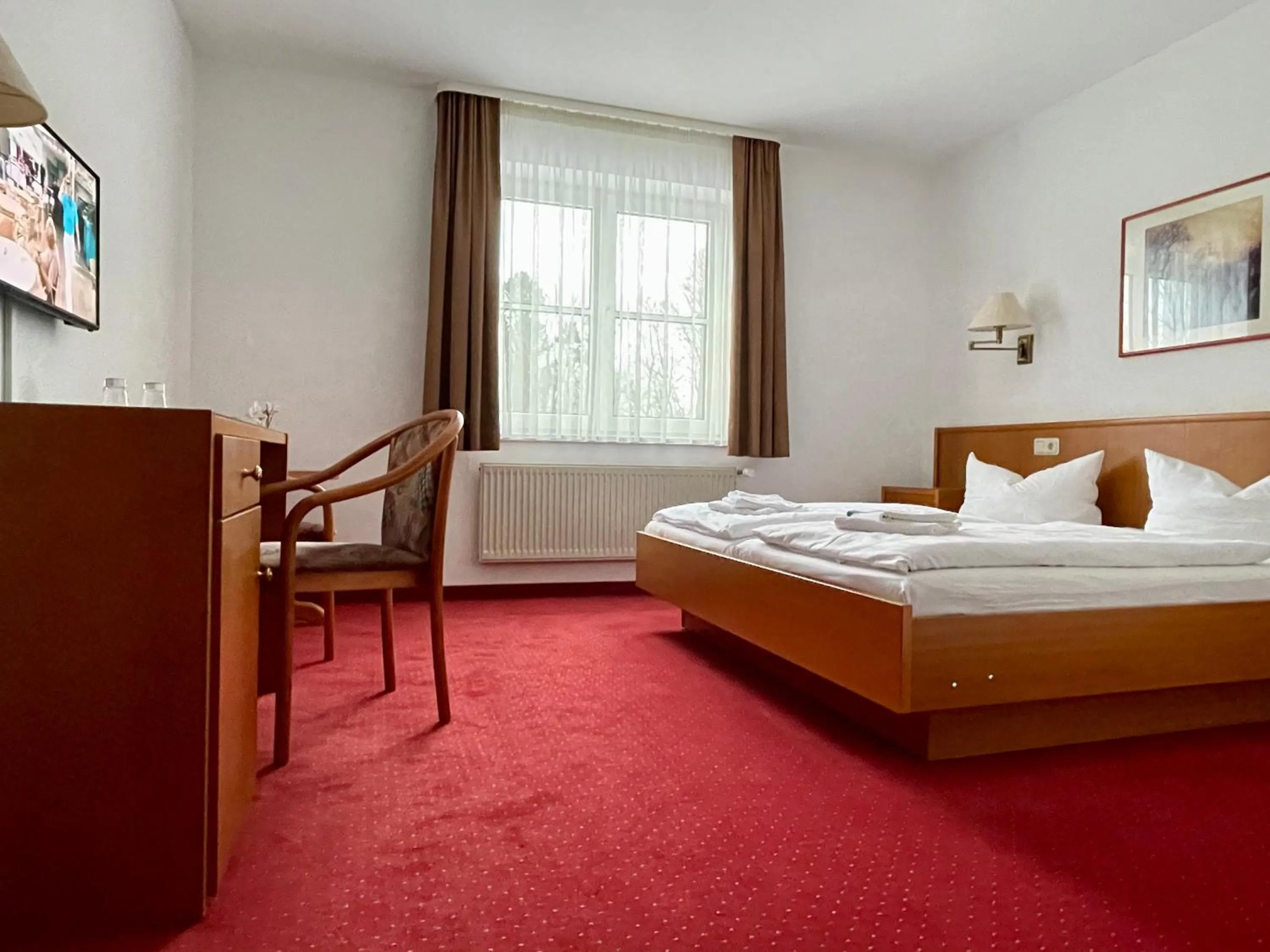 Photo of the whole room, Bed in gut-Hotel Pommernhotel Barth