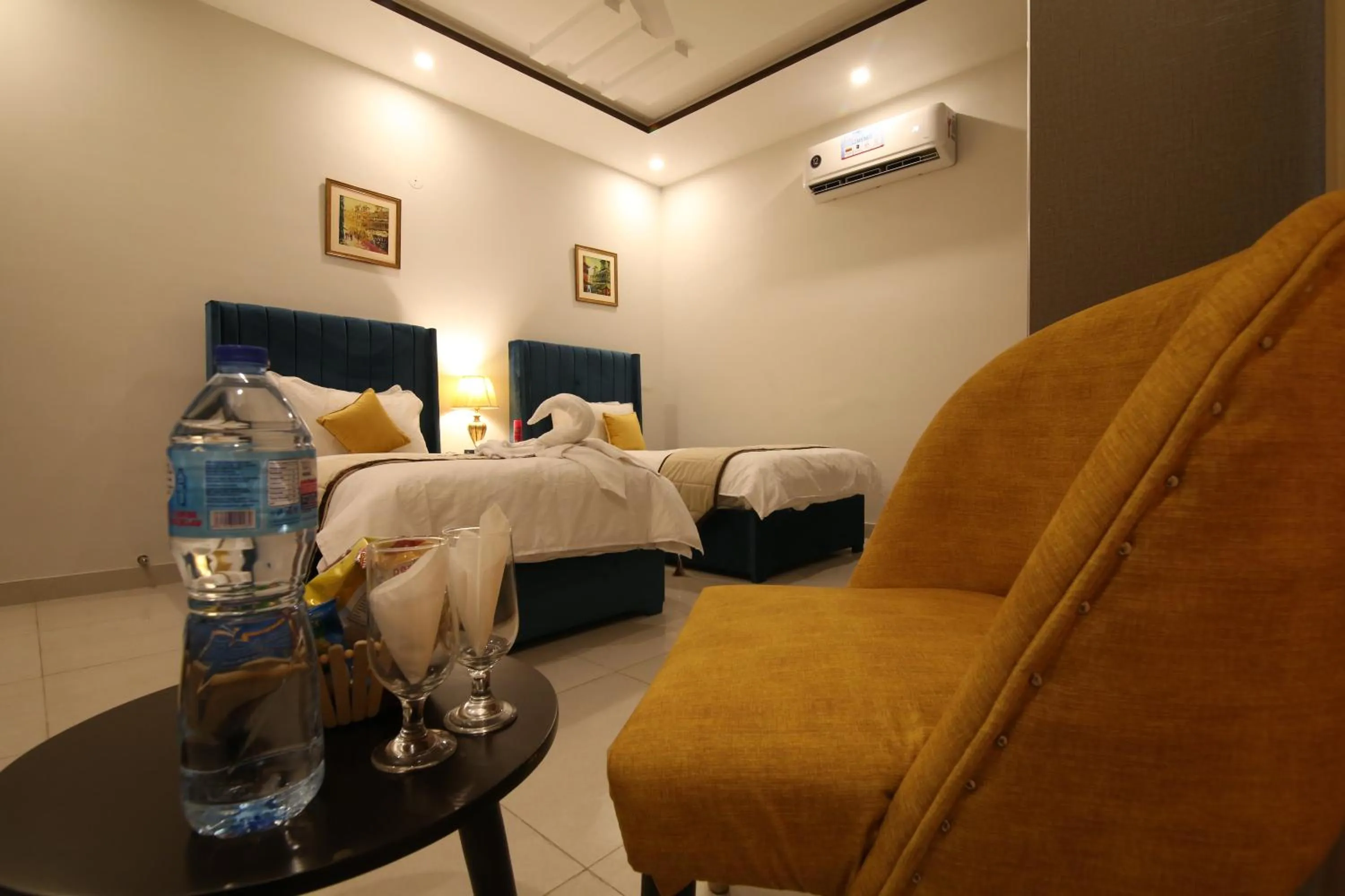 Bed in Cuzzy Inn Hotel