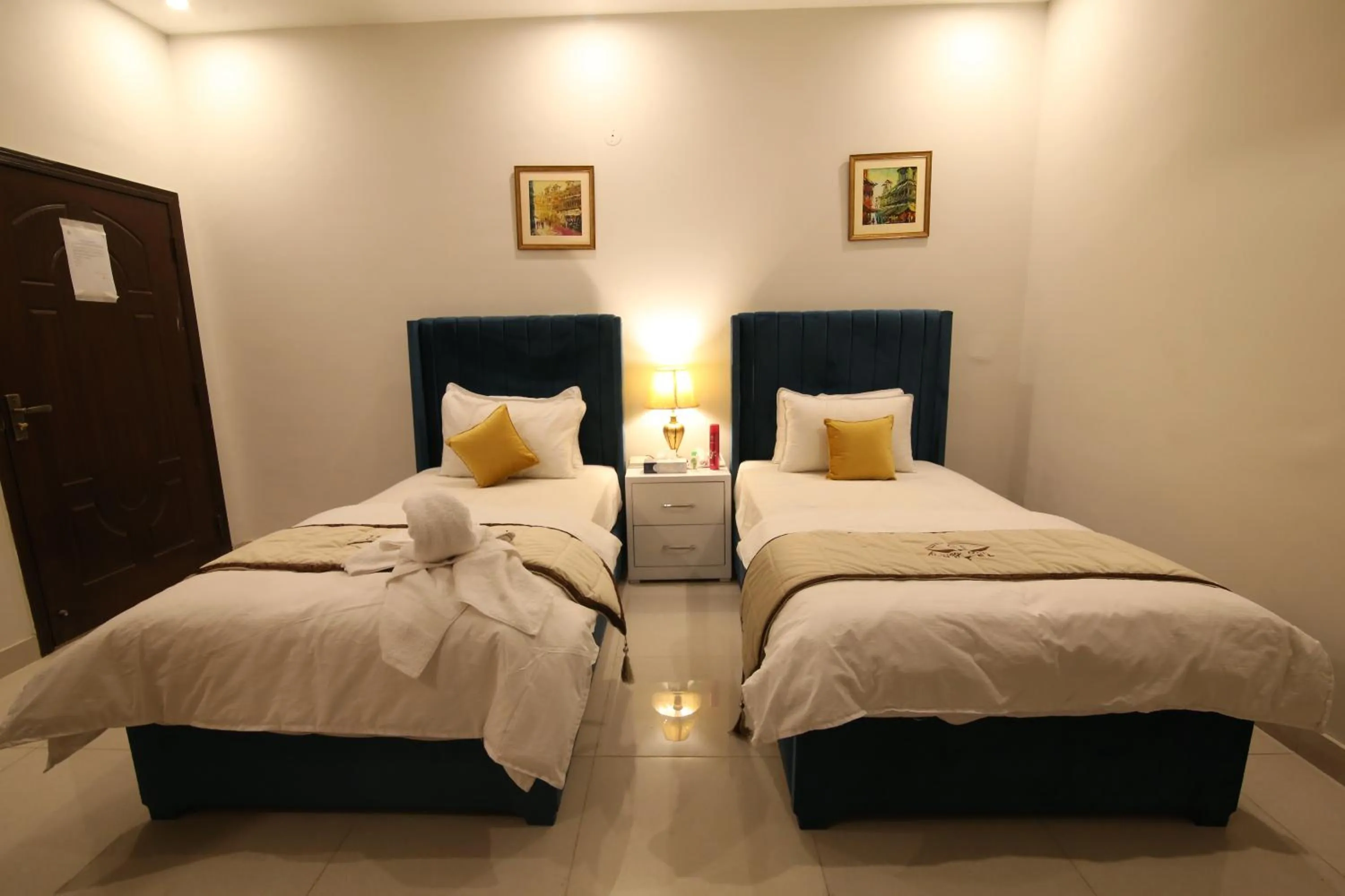 Bed in Cuzzy Inn Hotel