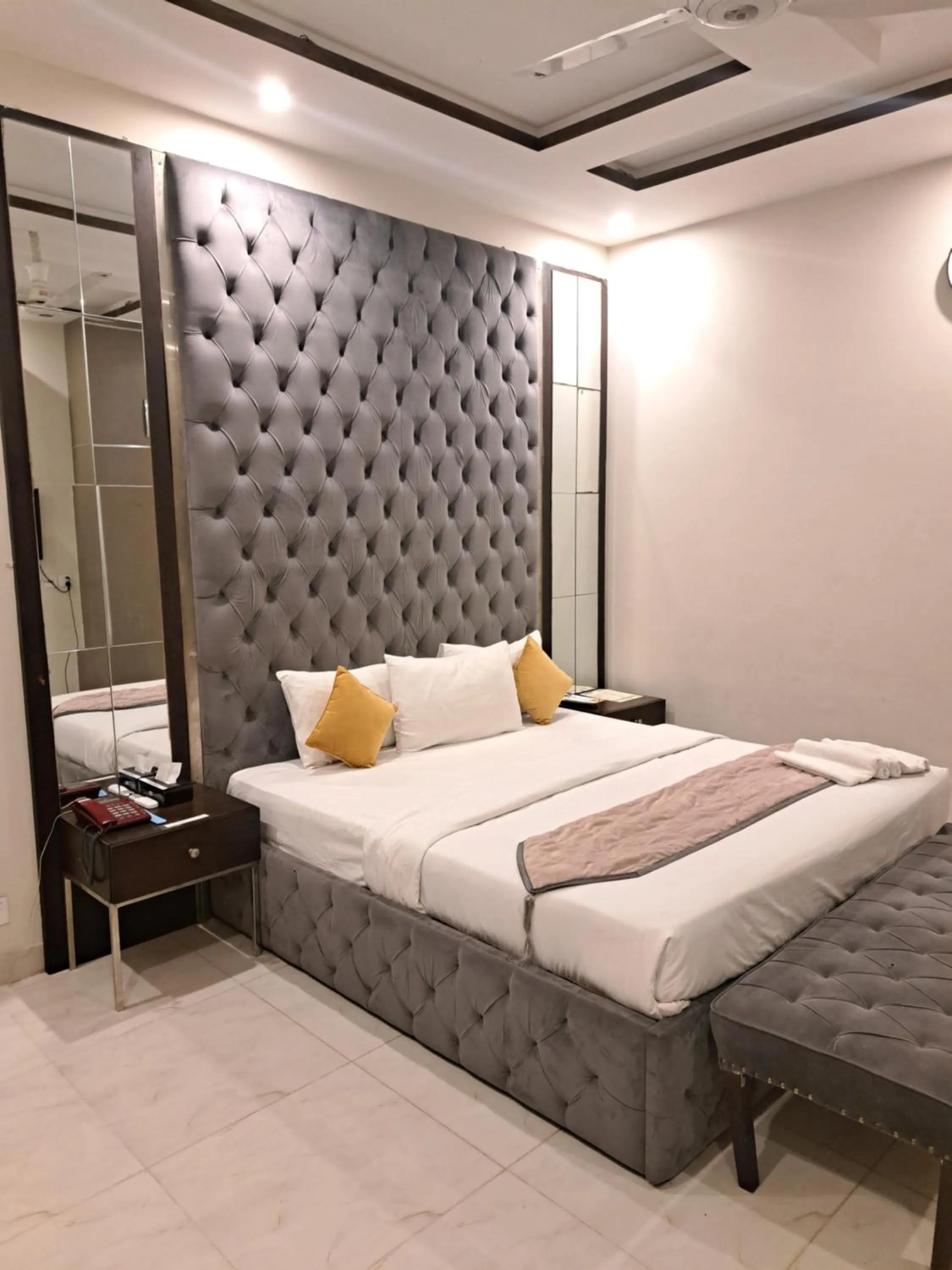 Bed in Cuzzy Inn Hotel