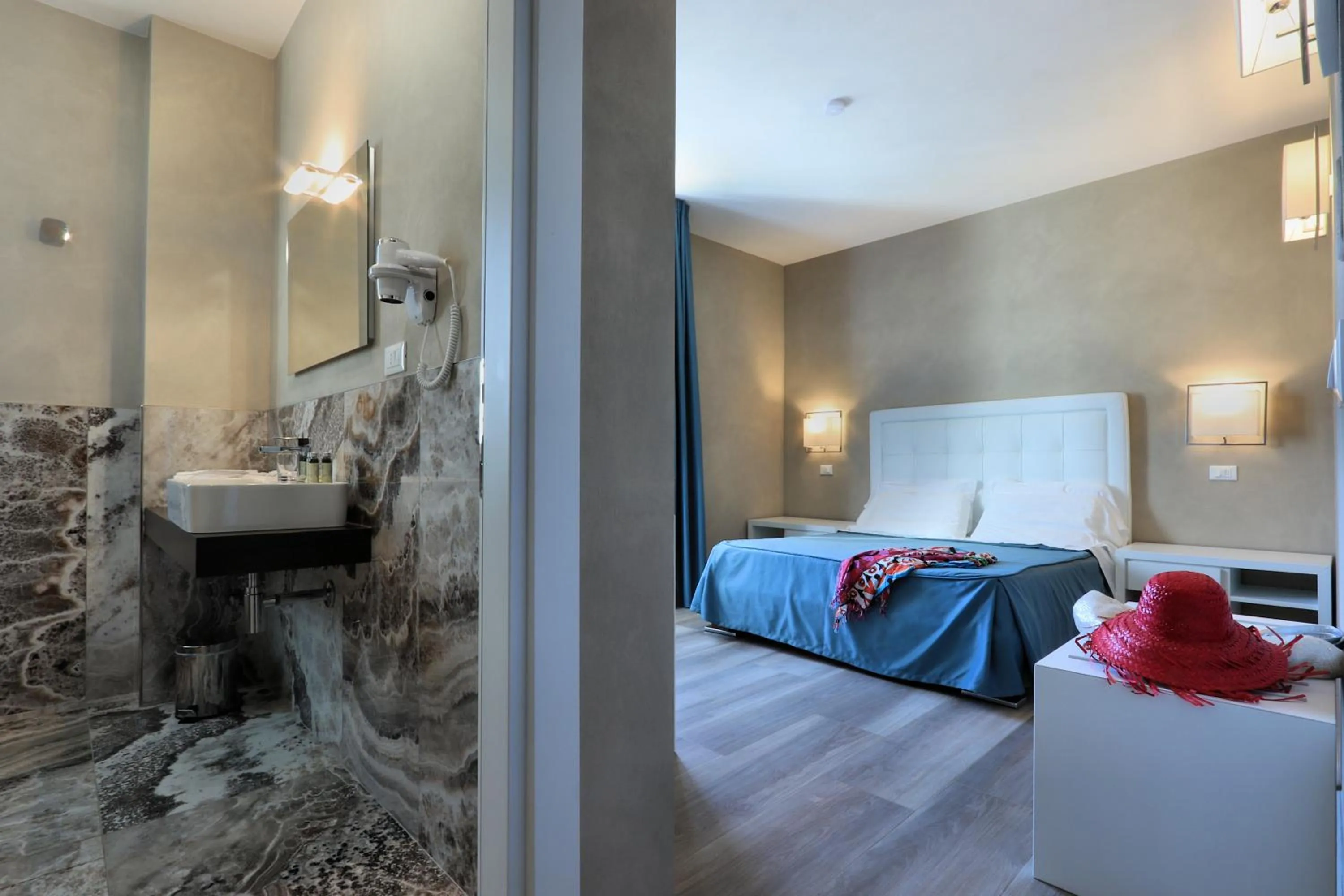 Bed in Hotel Cecina Beach