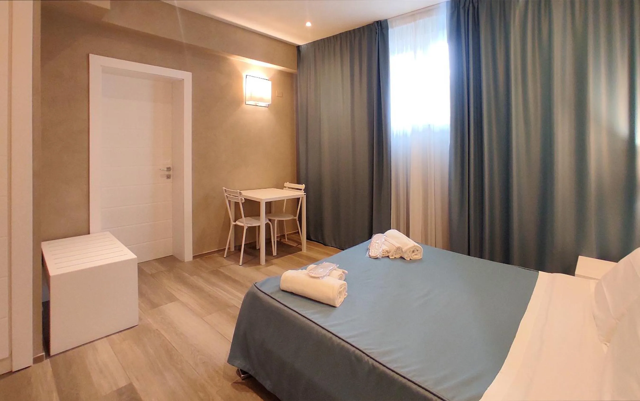 Bed in Hotel Cecina Beach