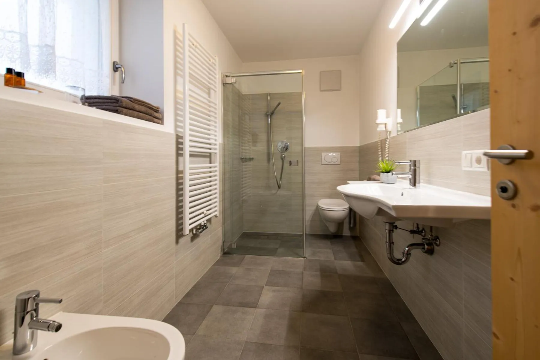 Bathroom in Apartments Sunela