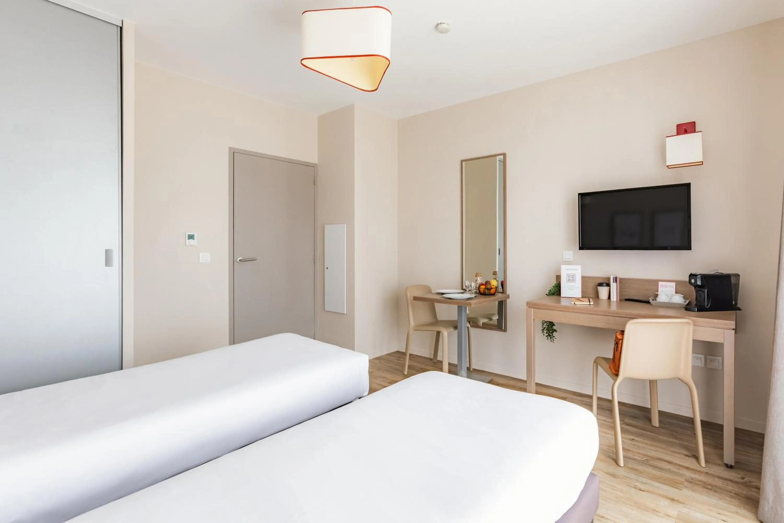 Bed in Appart'City Confort Cherbourg