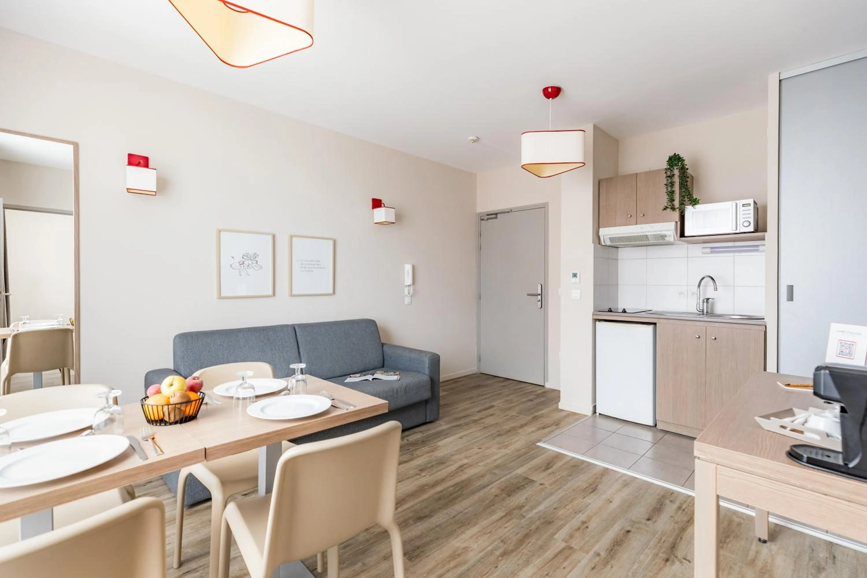 Kitchen or kitchenette in Appart'City Confort Cherbourg