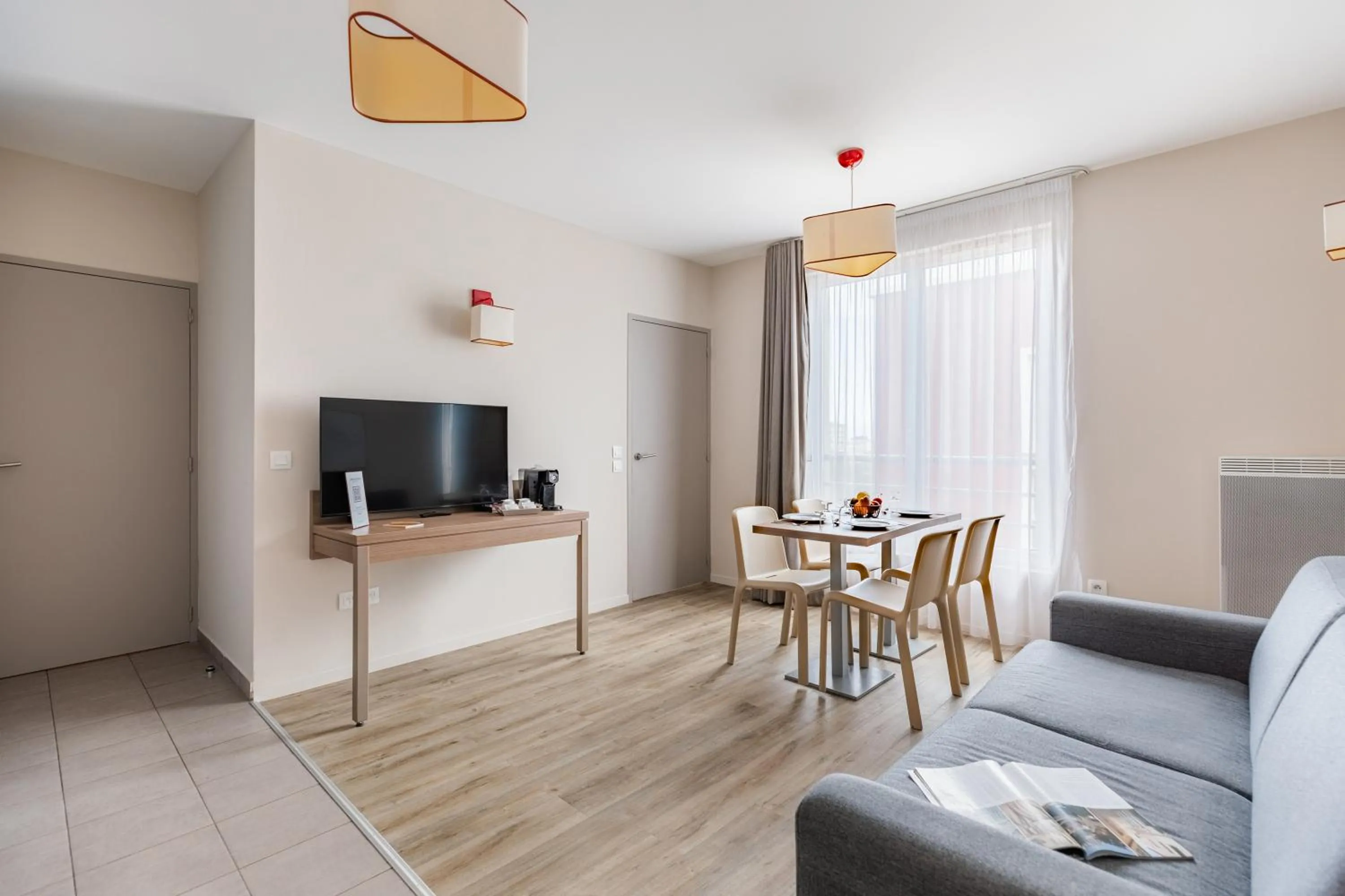 TV and multimedia in Appart'City Confort Cherbourg