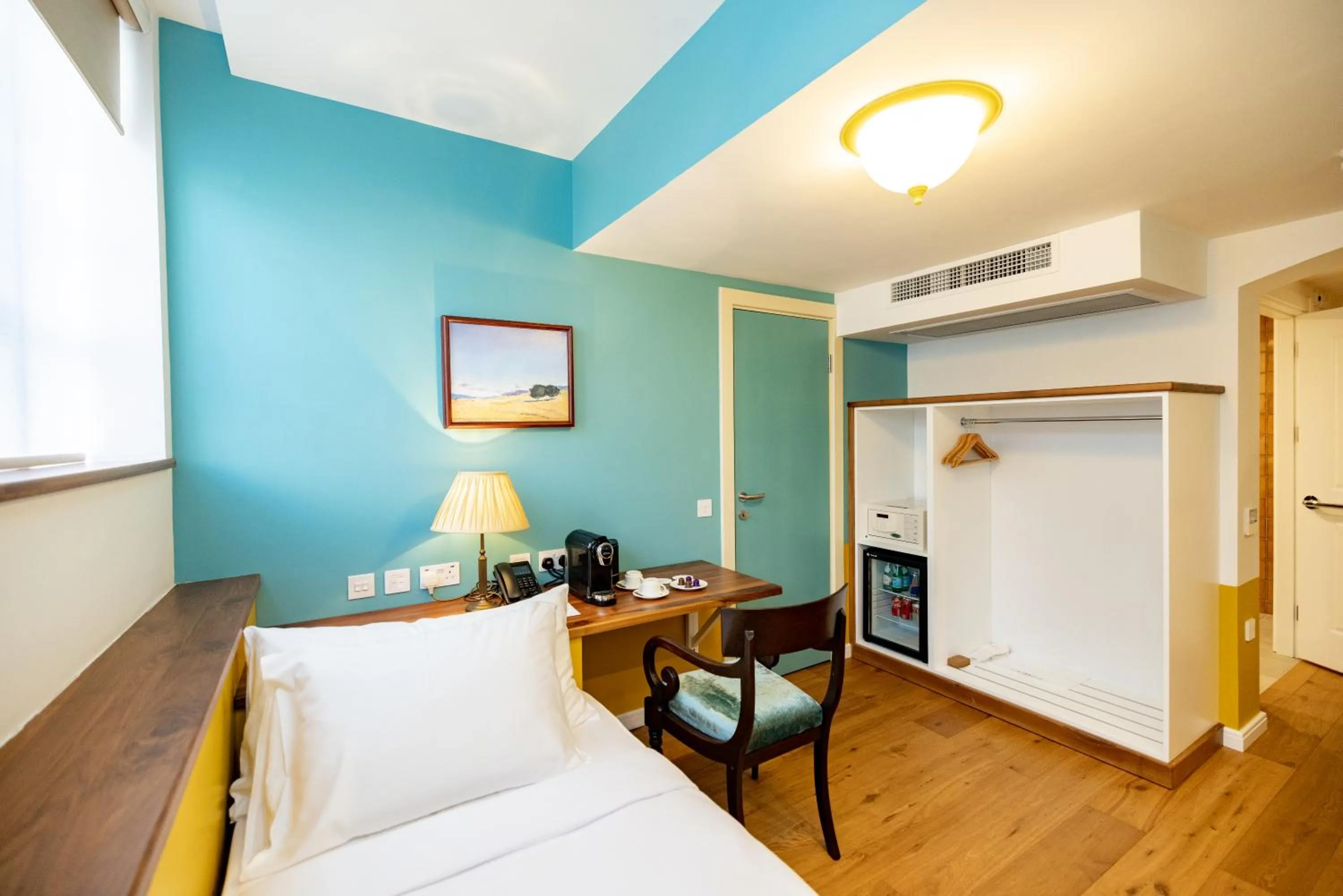 Bed in Limehouse Library Hotel