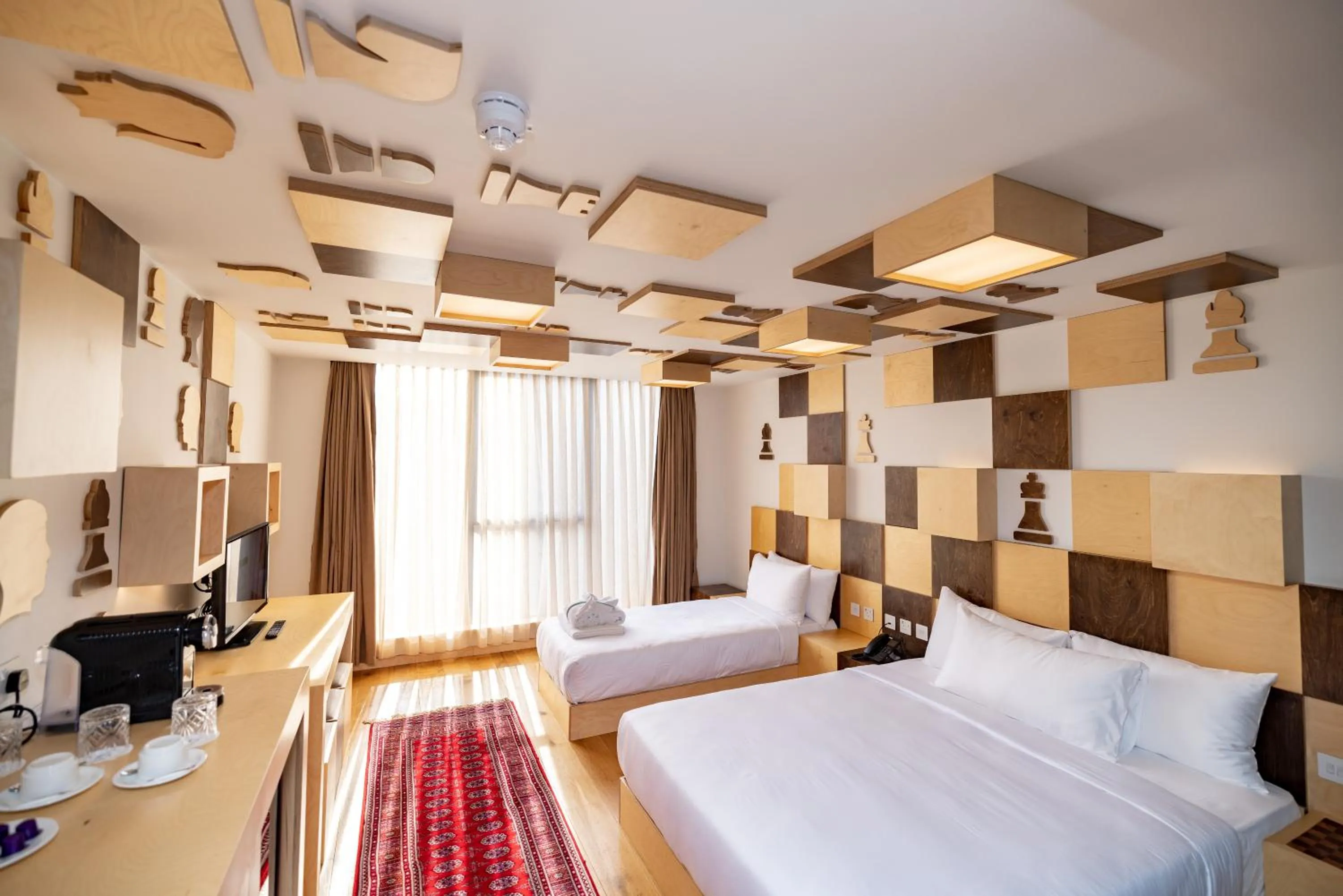 Bed in Limehouse Library Hotel