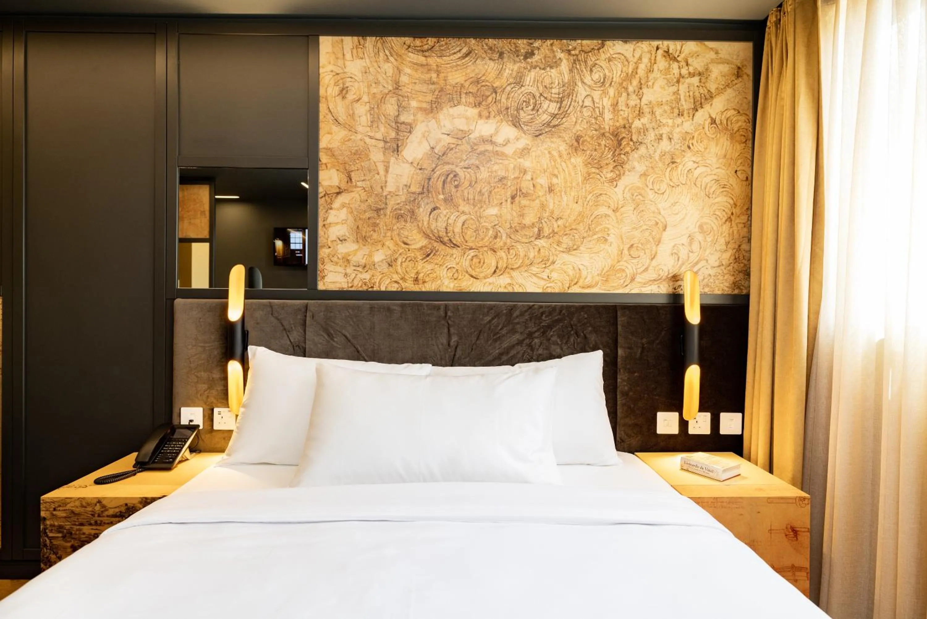 Bed in Limehouse Library Hotel