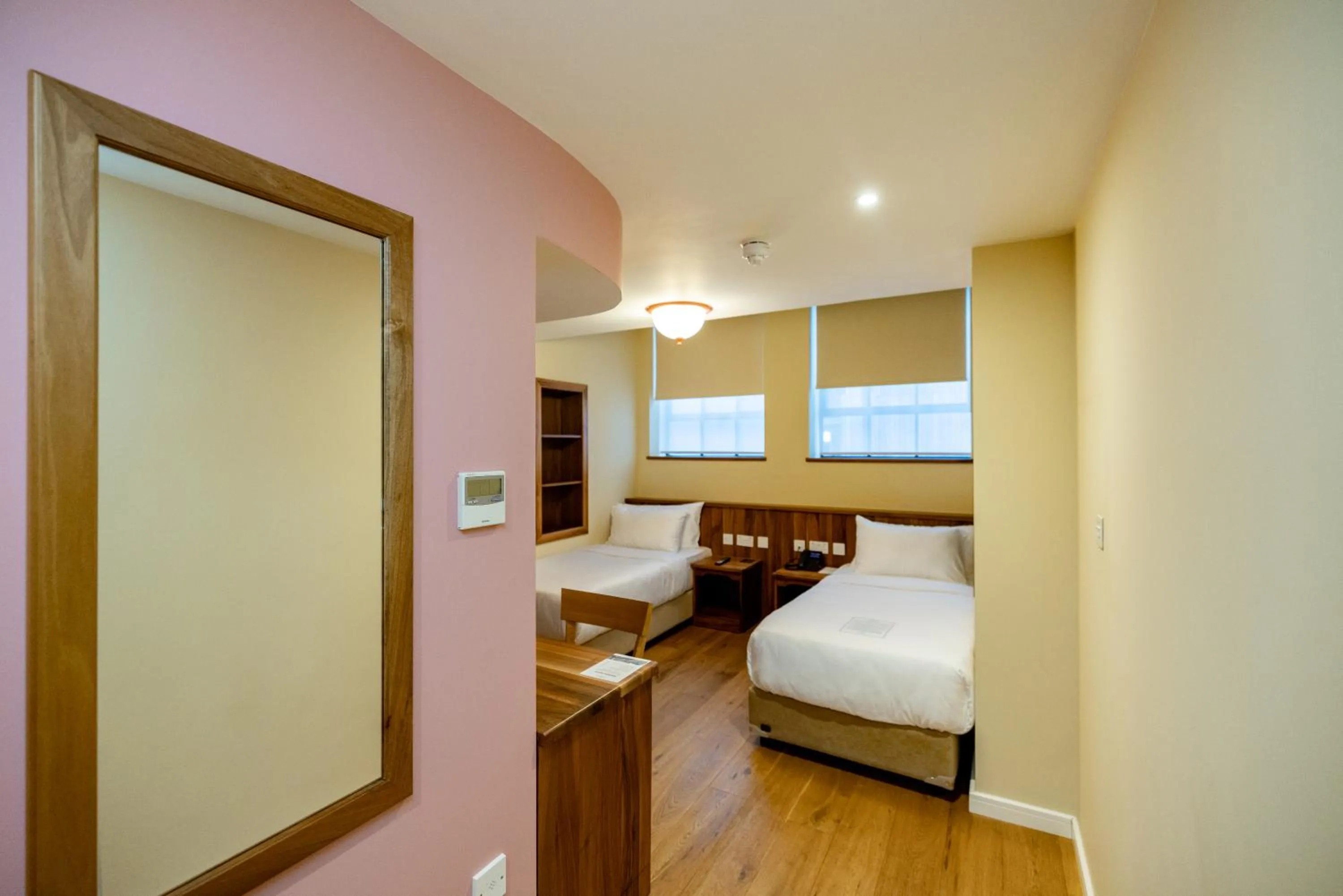 Bed in Limehouse Library Hotel