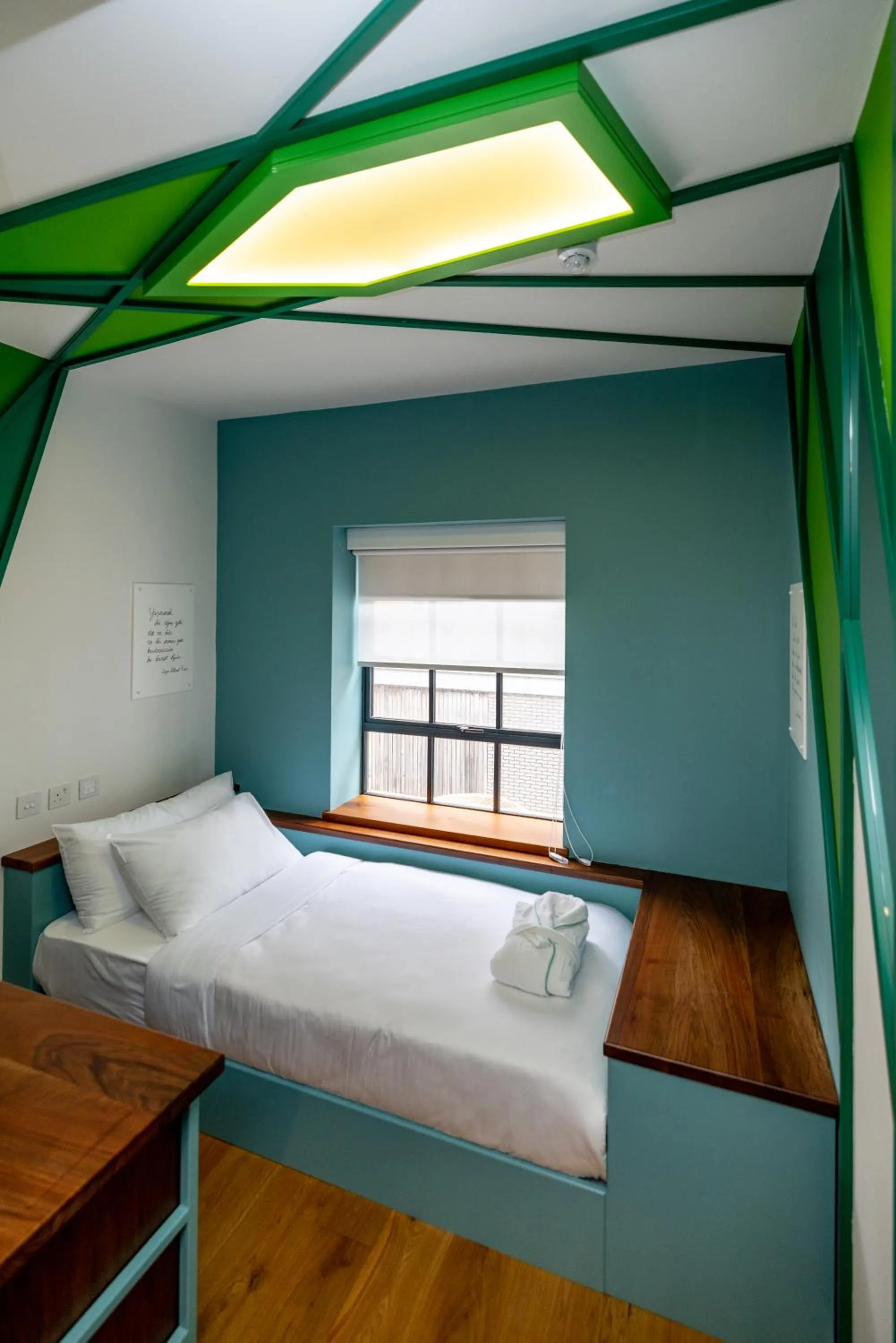 Bed in Limehouse Library Hotel