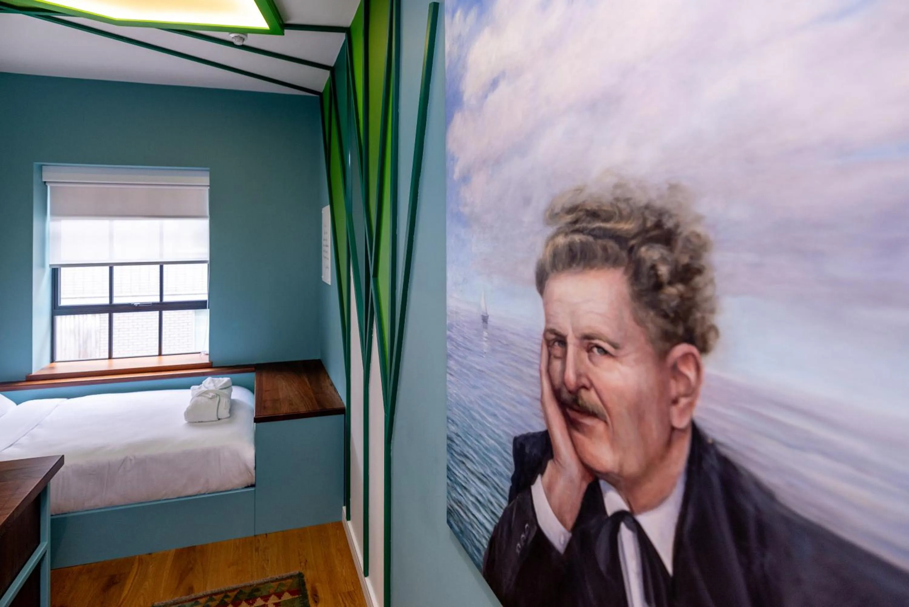 Bed in Limehouse Library Hotel