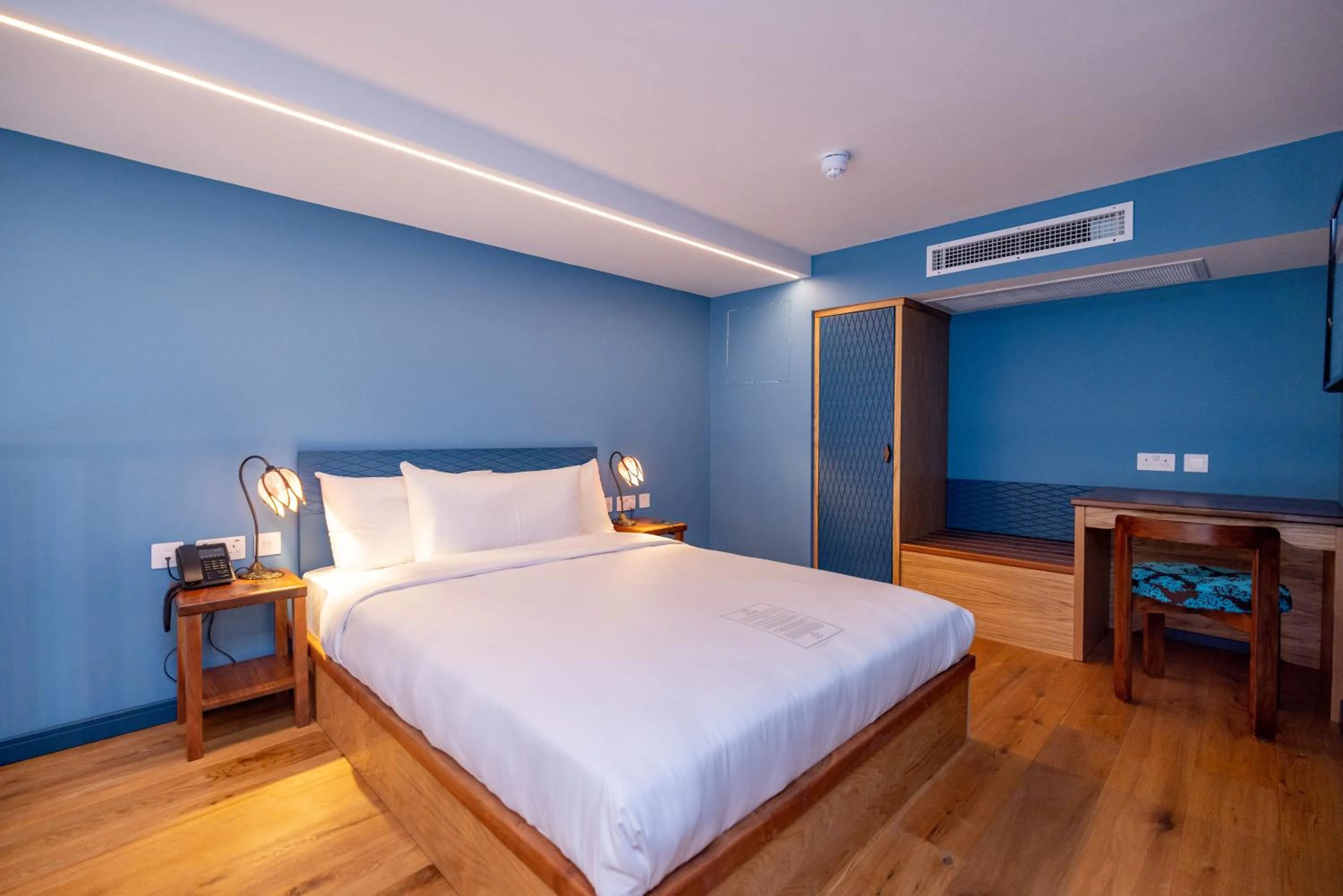 Bed in Limehouse Library Hotel