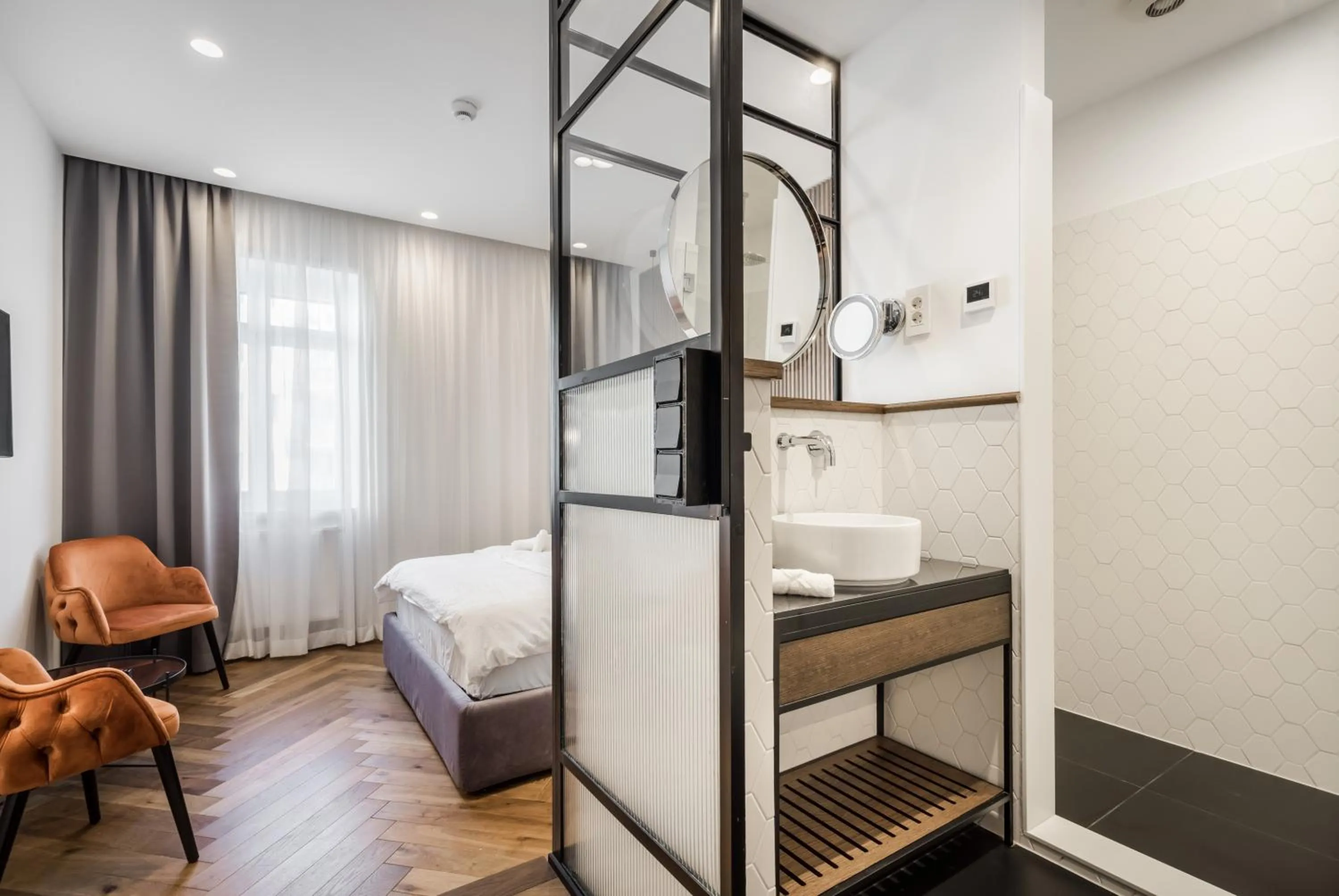 Bathroom, Bed in Budapest Eye- Boutique Suites, by BQA