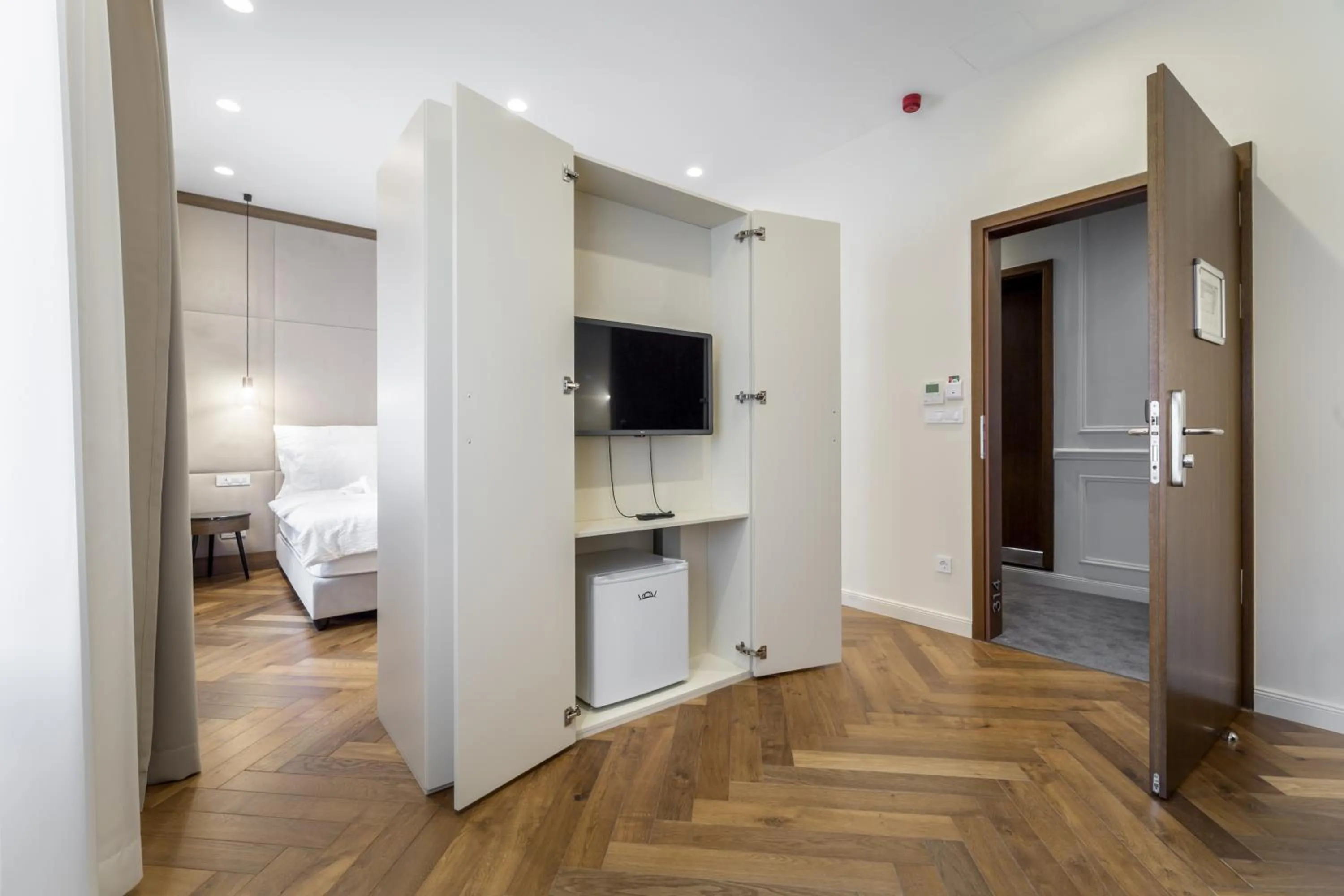 Living room, Bed in Budapest Eye- Boutique Suites, by BQA
