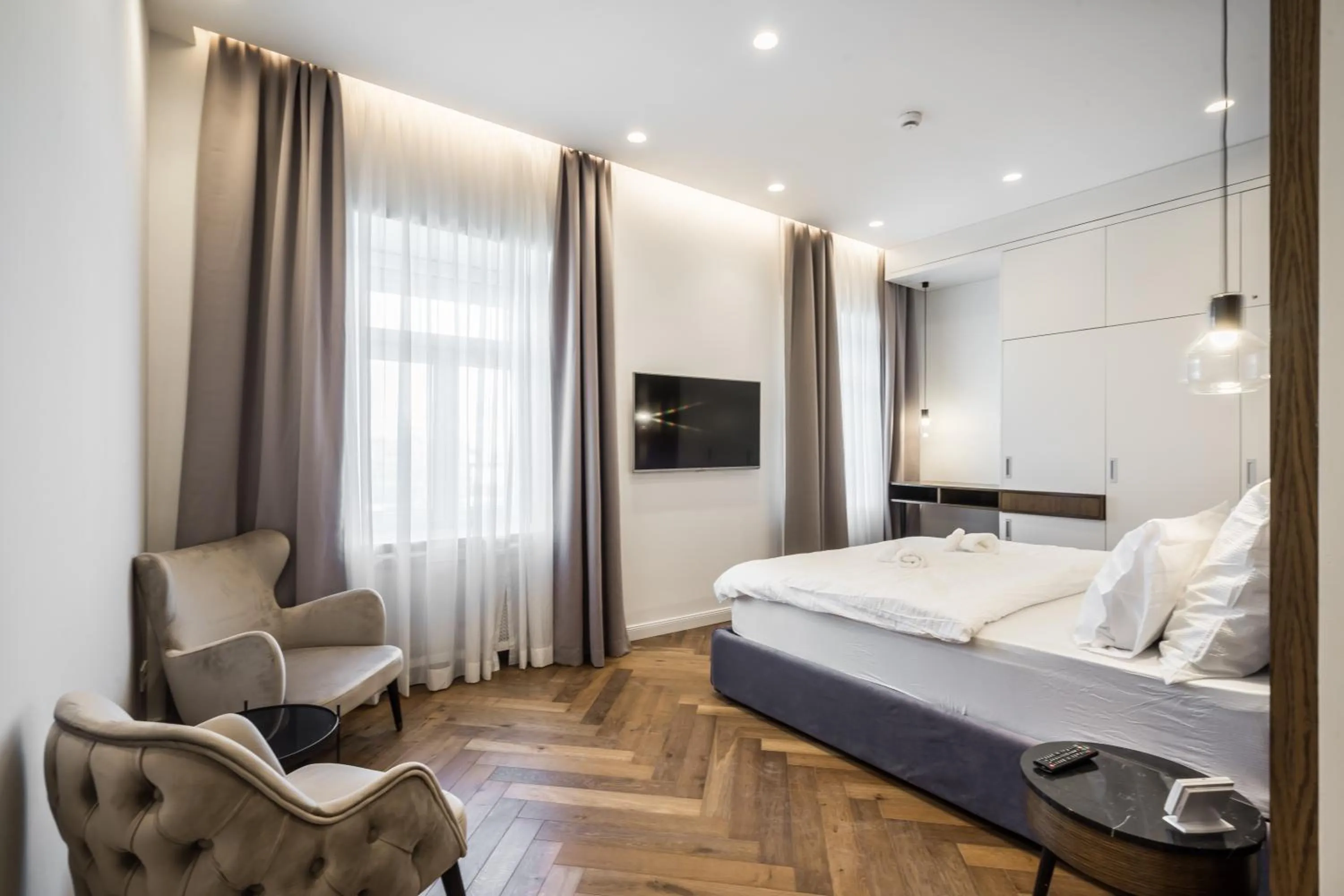 Photo of the whole room, Bed in Budapest Eye- Boutique Suites, by BQA