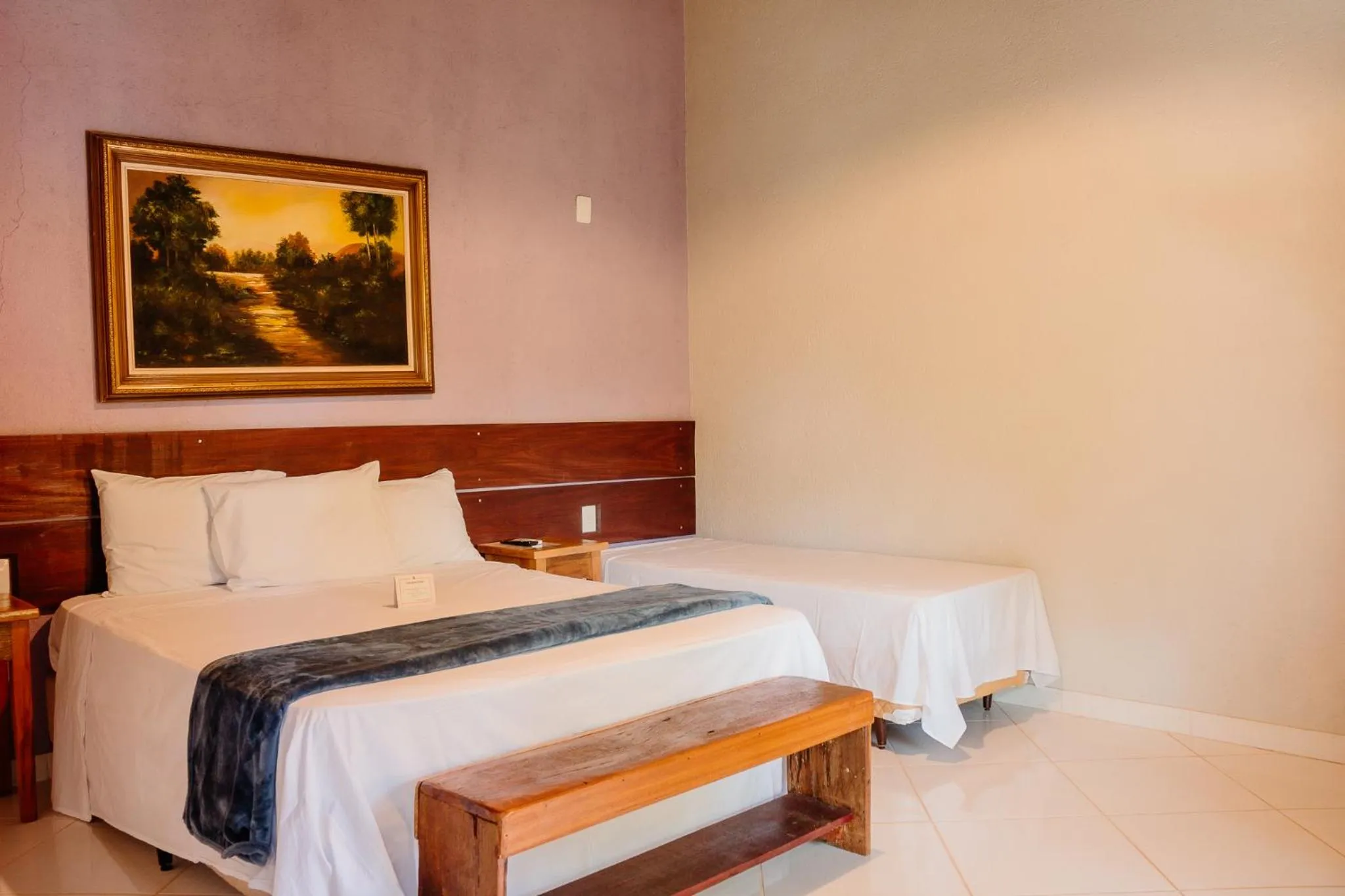 Bed in Pousada Adega Cipo