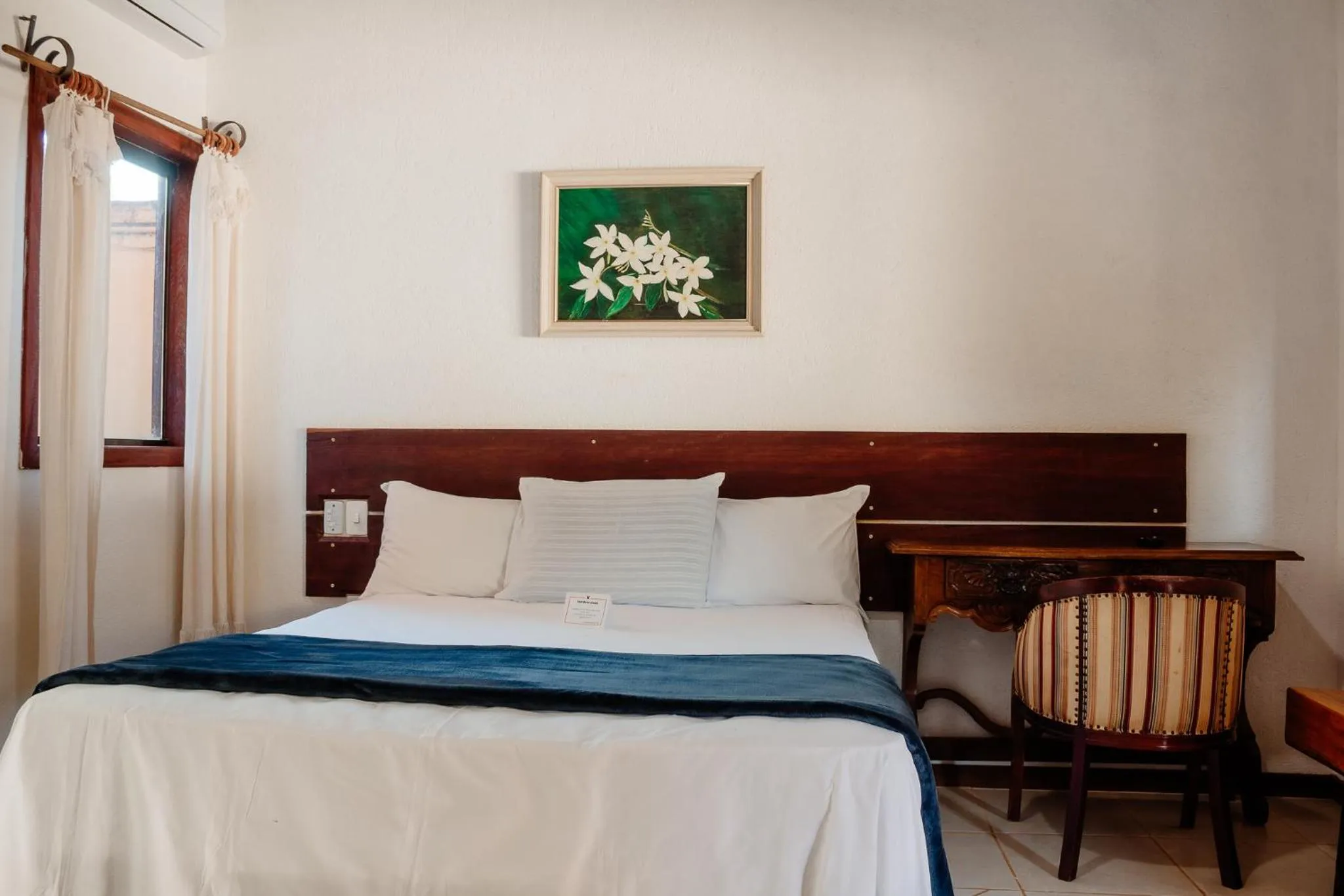 Bed in Pousada Adega Cipo