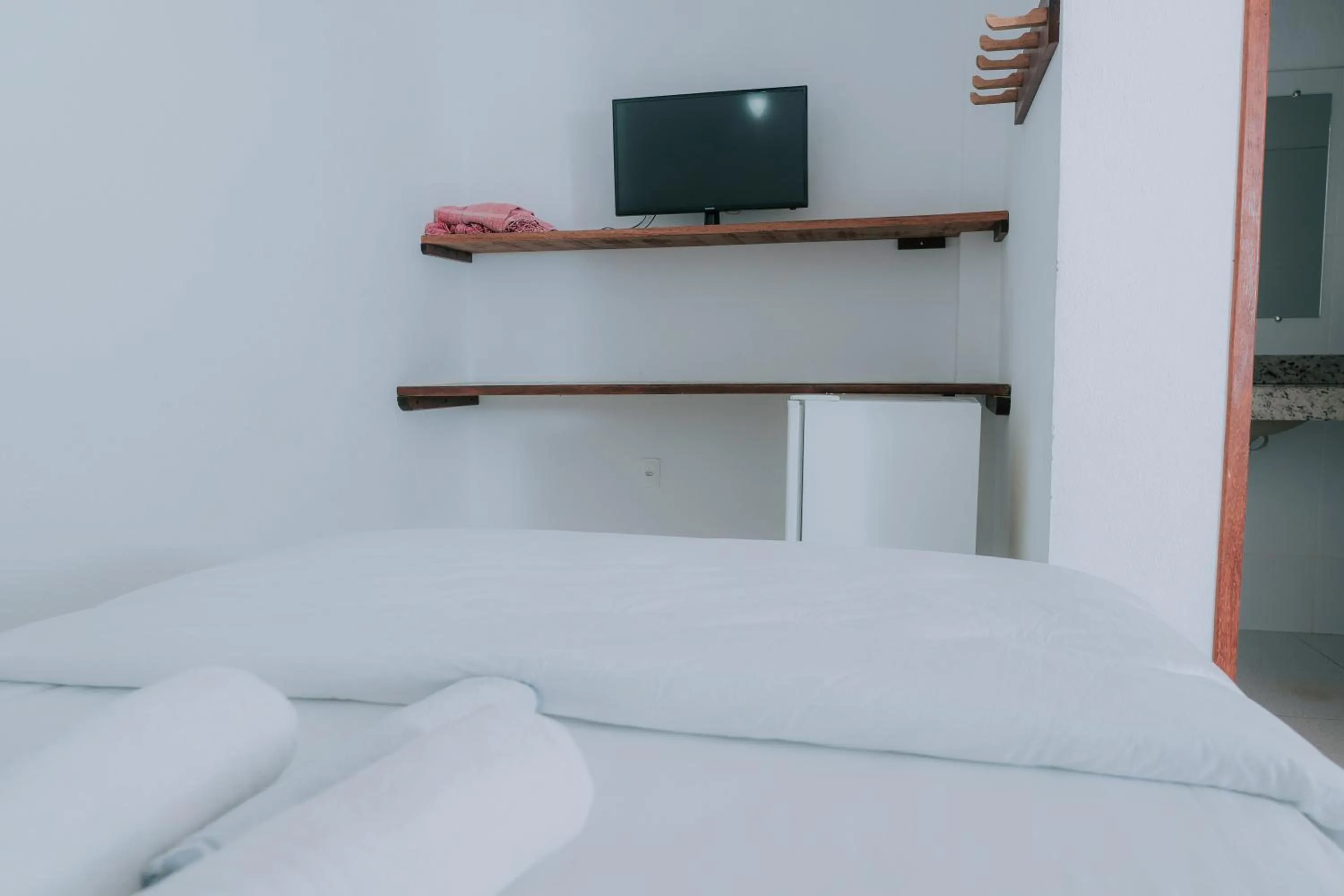 Bed in Pousada Adega Cipo